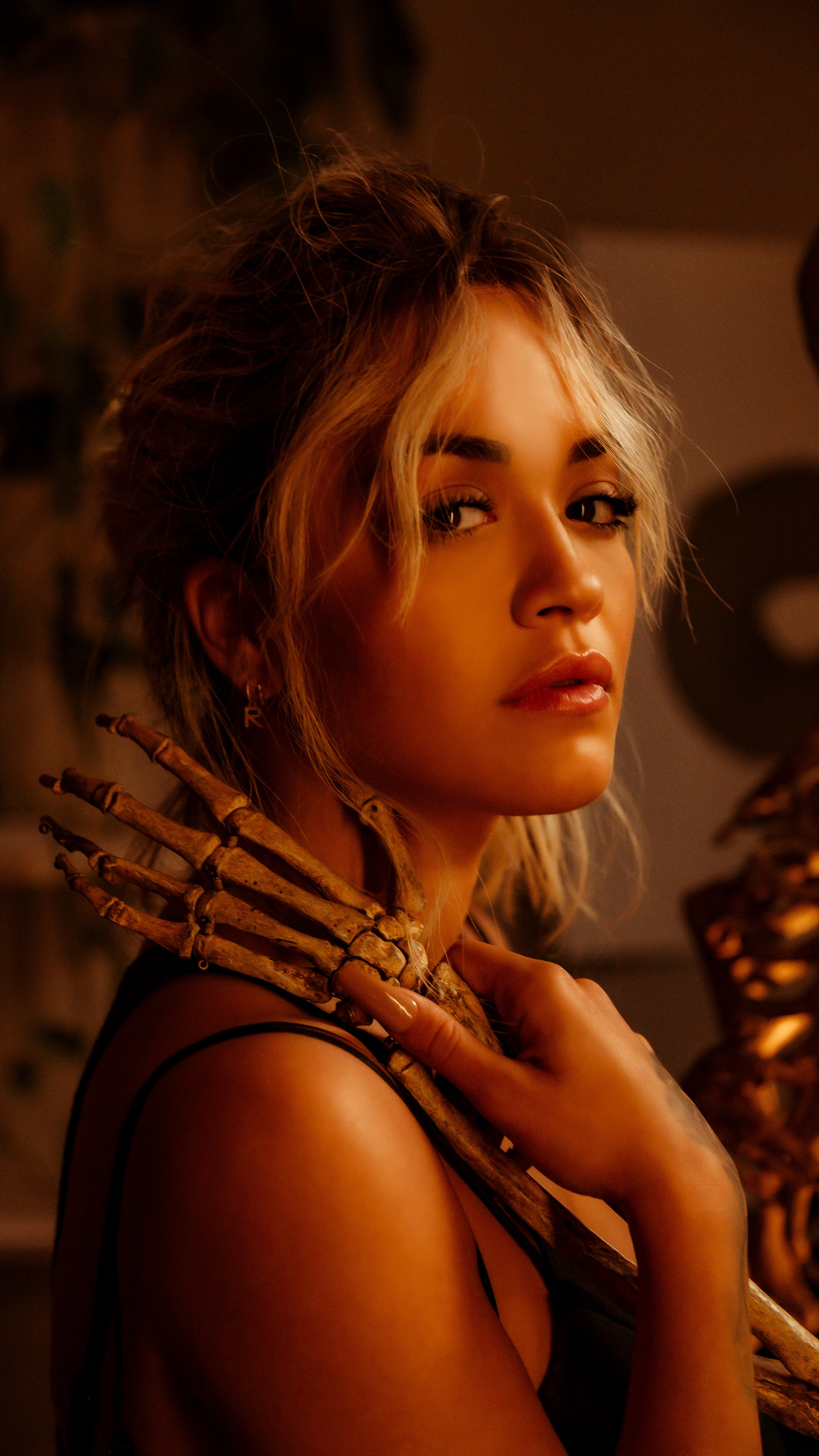 Rita Ora with skeleton arm HD Phone Wallpaper
