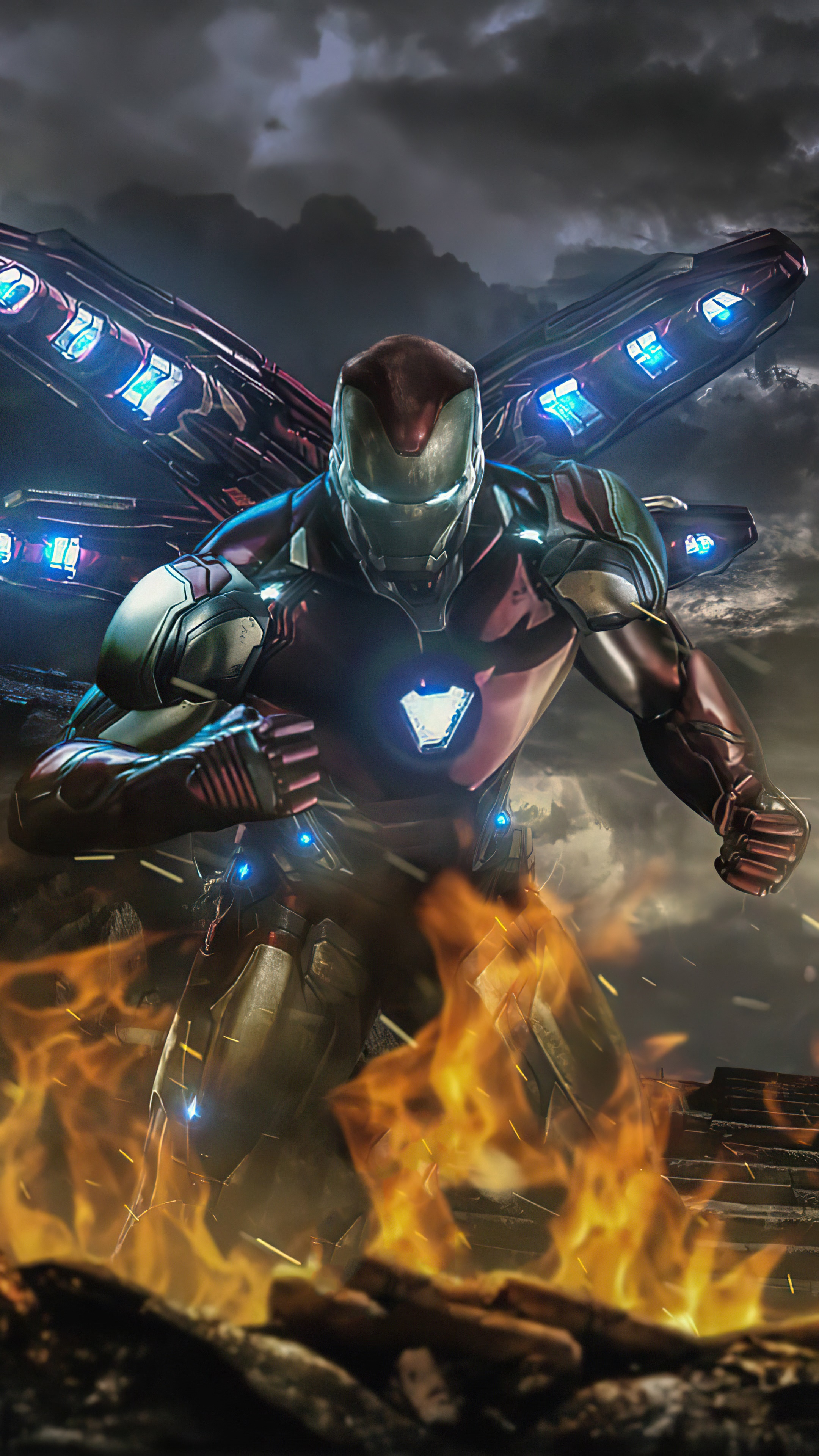 Iron Man in front of flames and stormy sky HD Phone Wallpaper