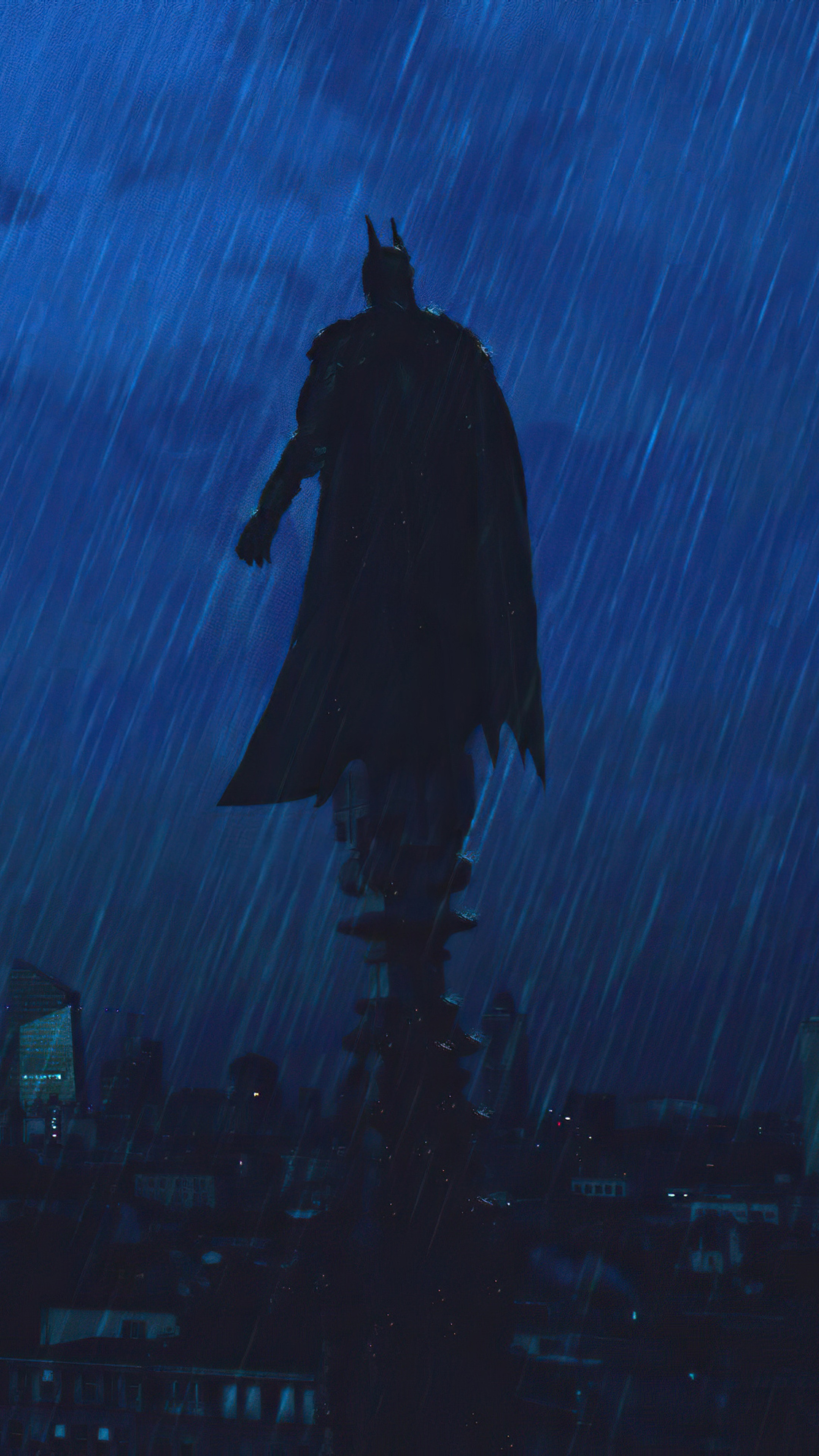 Batman standing on a building in the rain HD Phone Wallpaper
