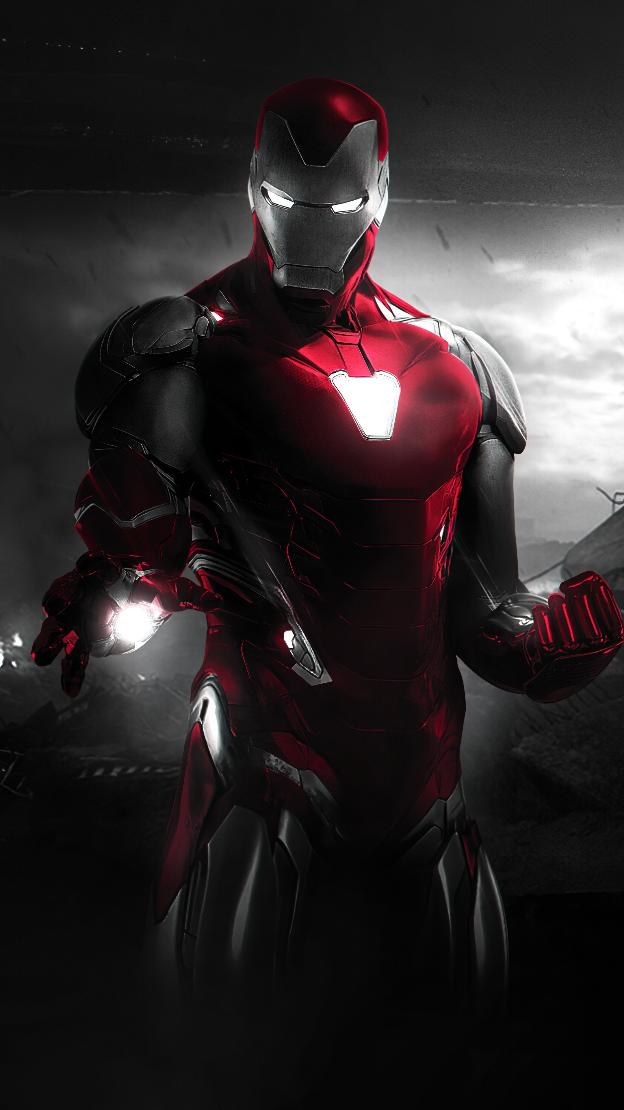 Iron Man in a dark, dramatic setting HD Phone Wallpaper