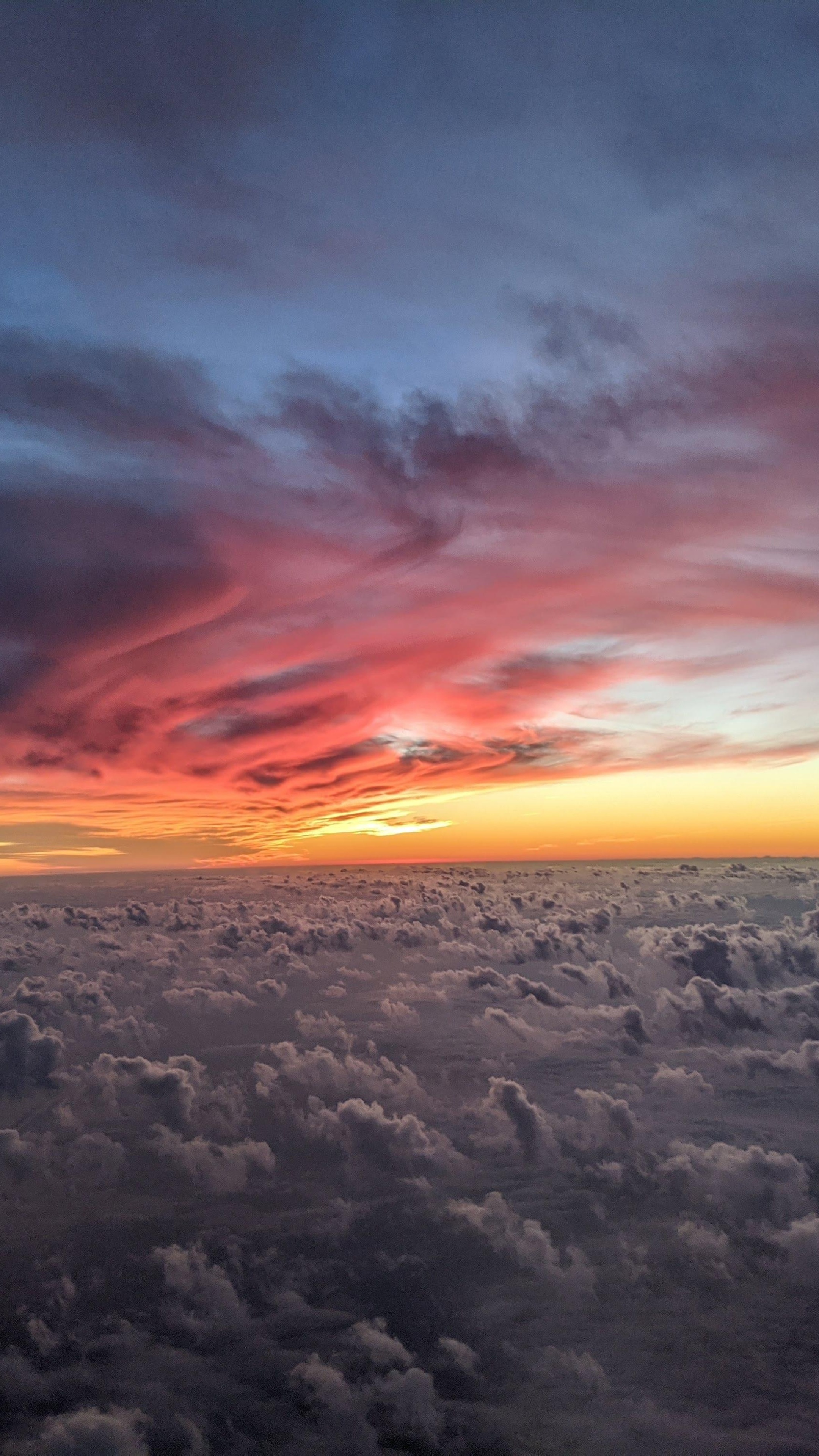Sunset clouds over a sea of clouds HD Phone Wallpaper