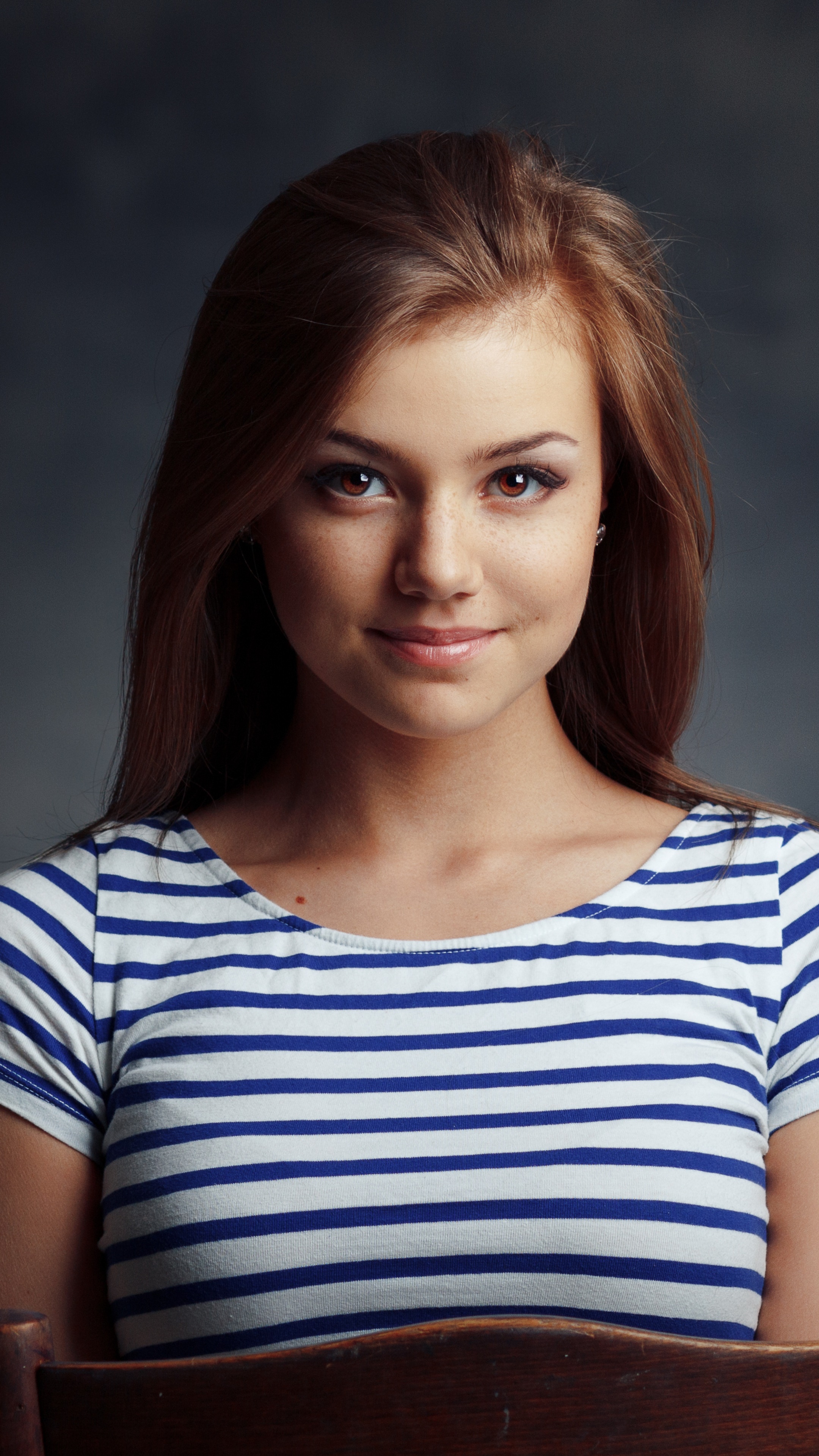 Young woman with brown hair wearing a striped shirt HD Phone Wallpaper
