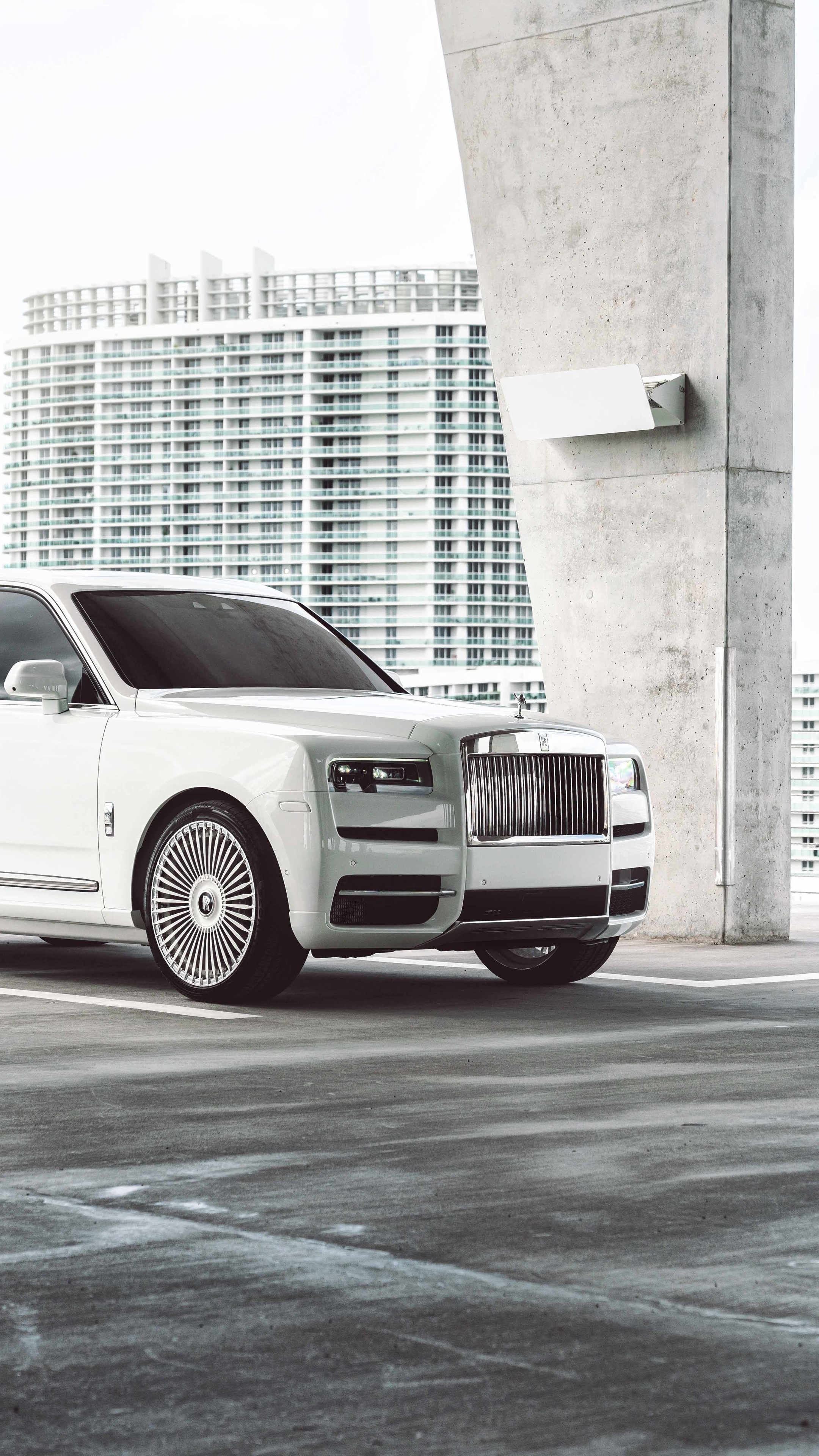 White Rolls-Royce Cullinan parked near a building HD Phone Wallpaper