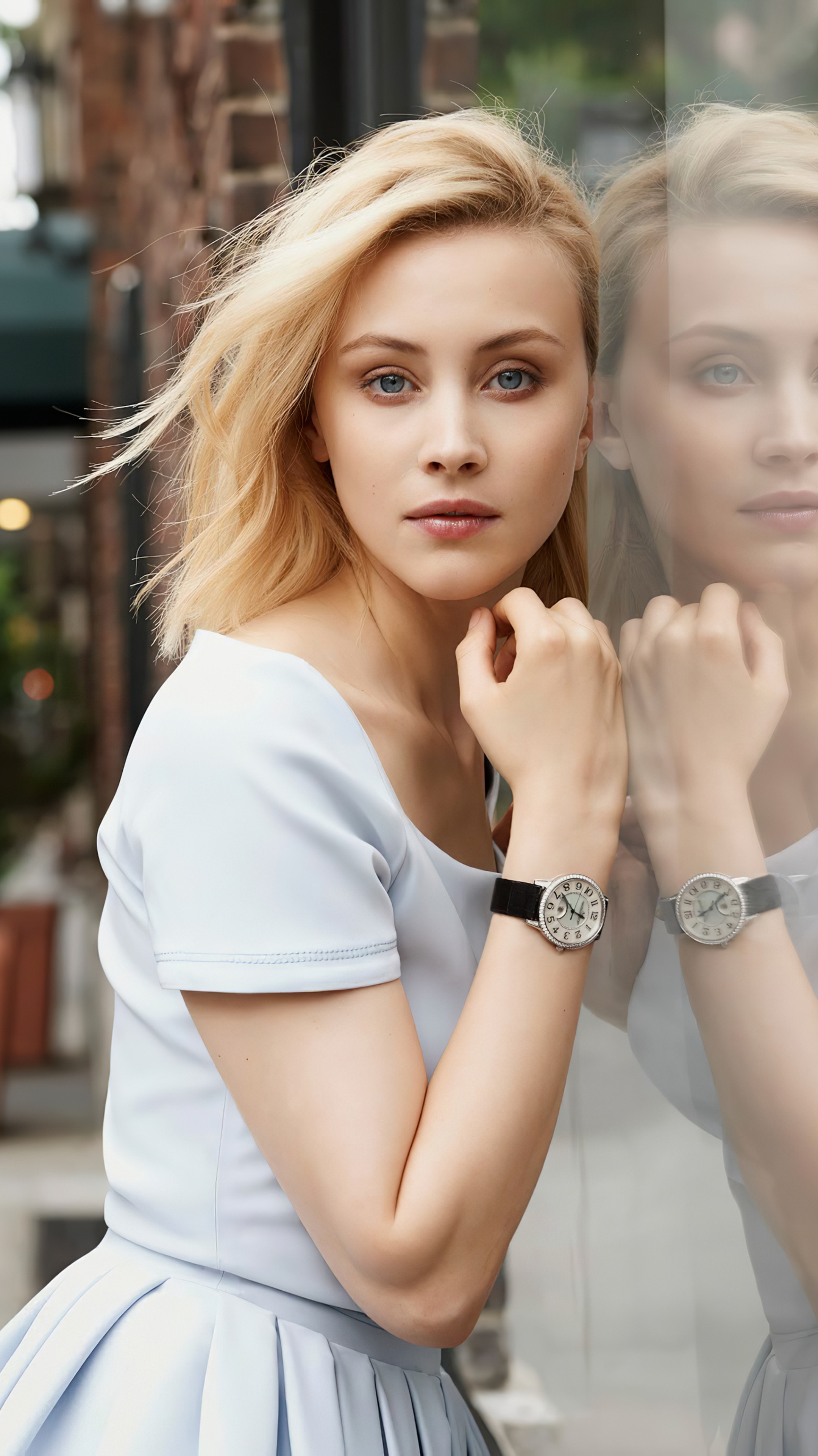 Sarah Gadon wearing a light blue dress and watch HD Phone Wallpaper