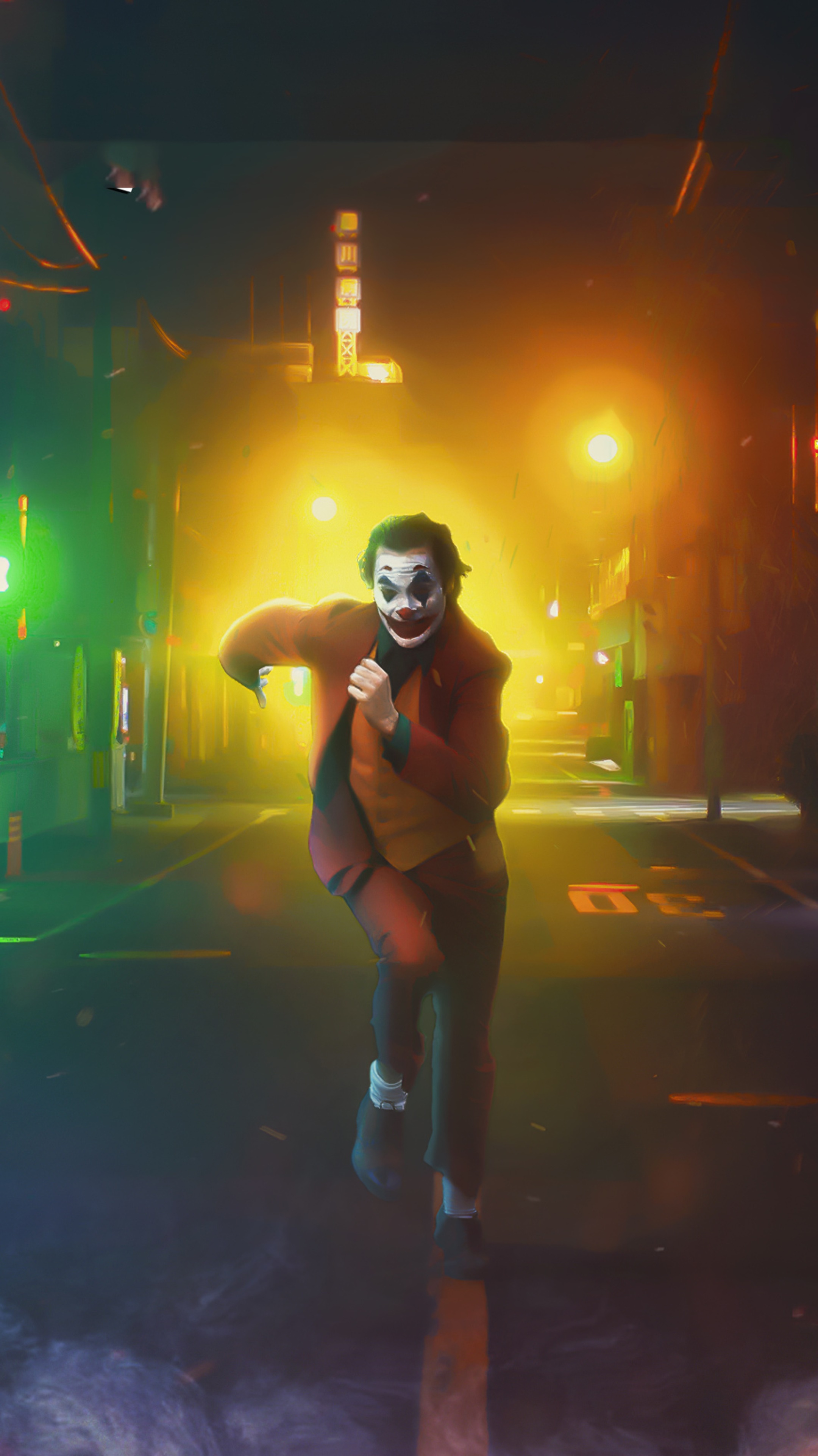 Joker running in a city street at night HD Phone Wallpaper