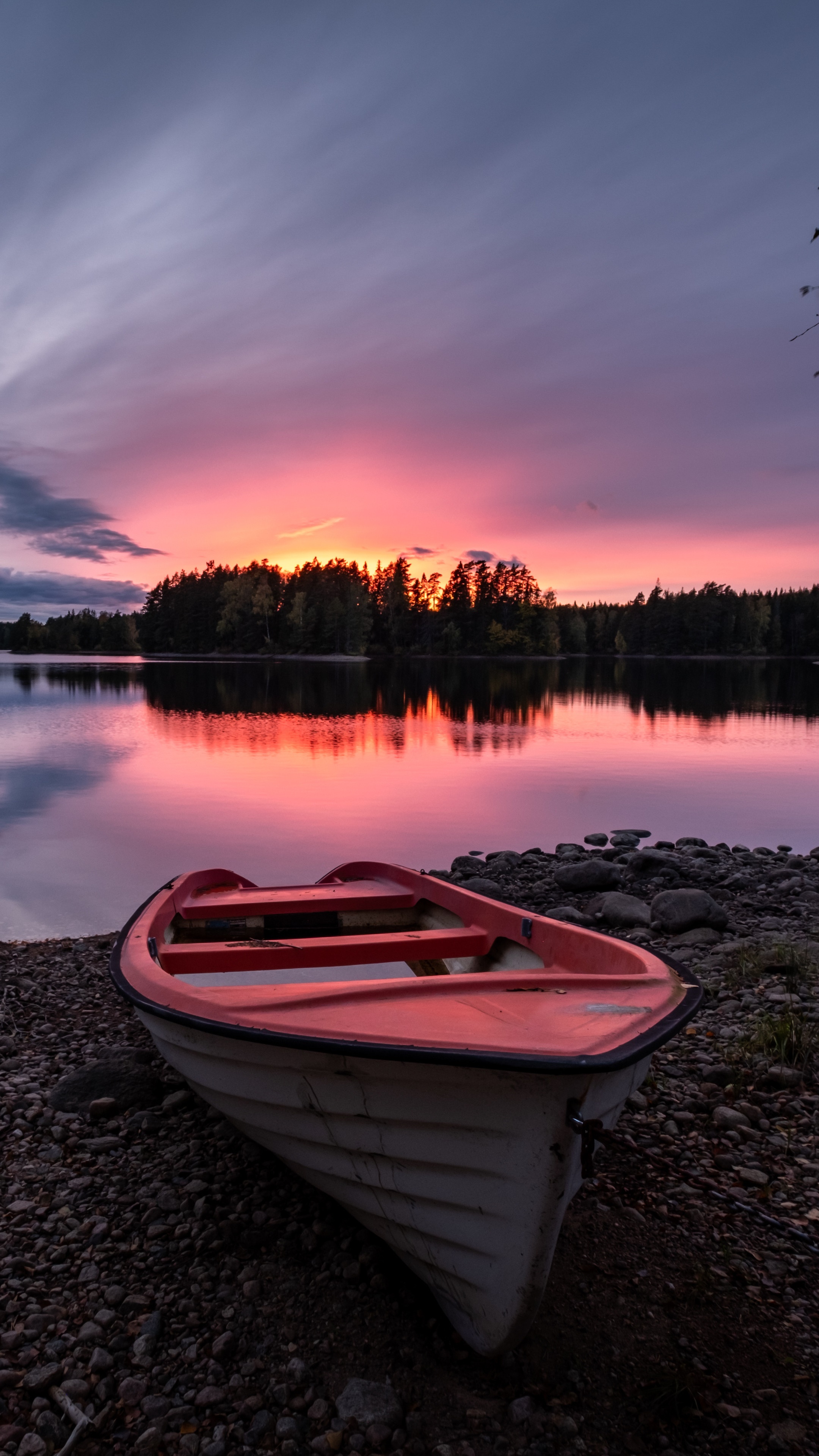 Boat on a rocky shore during sunset HD Phone Wallpaper