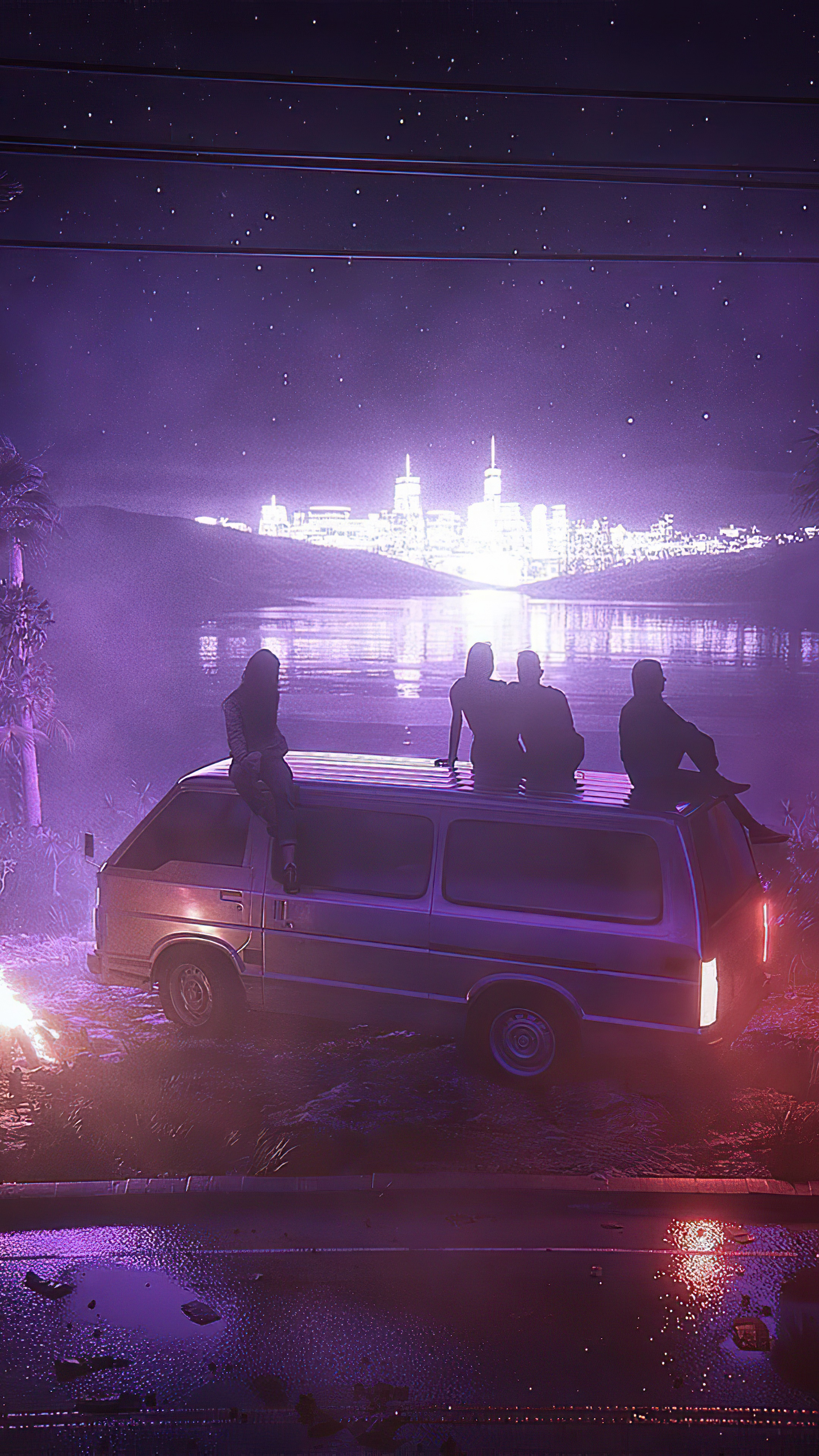 Group of people on a van overlooking a city skyline HD Phone Wallpaper