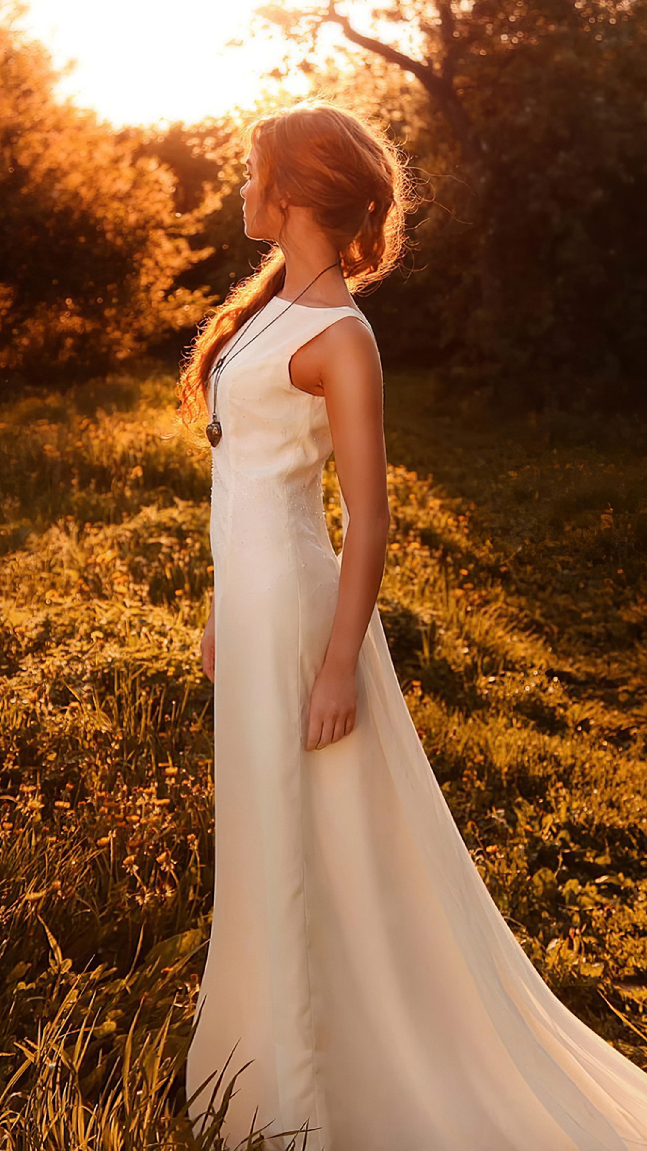 Girl in white dress in a sunlit forest HD Phone Wallpaper