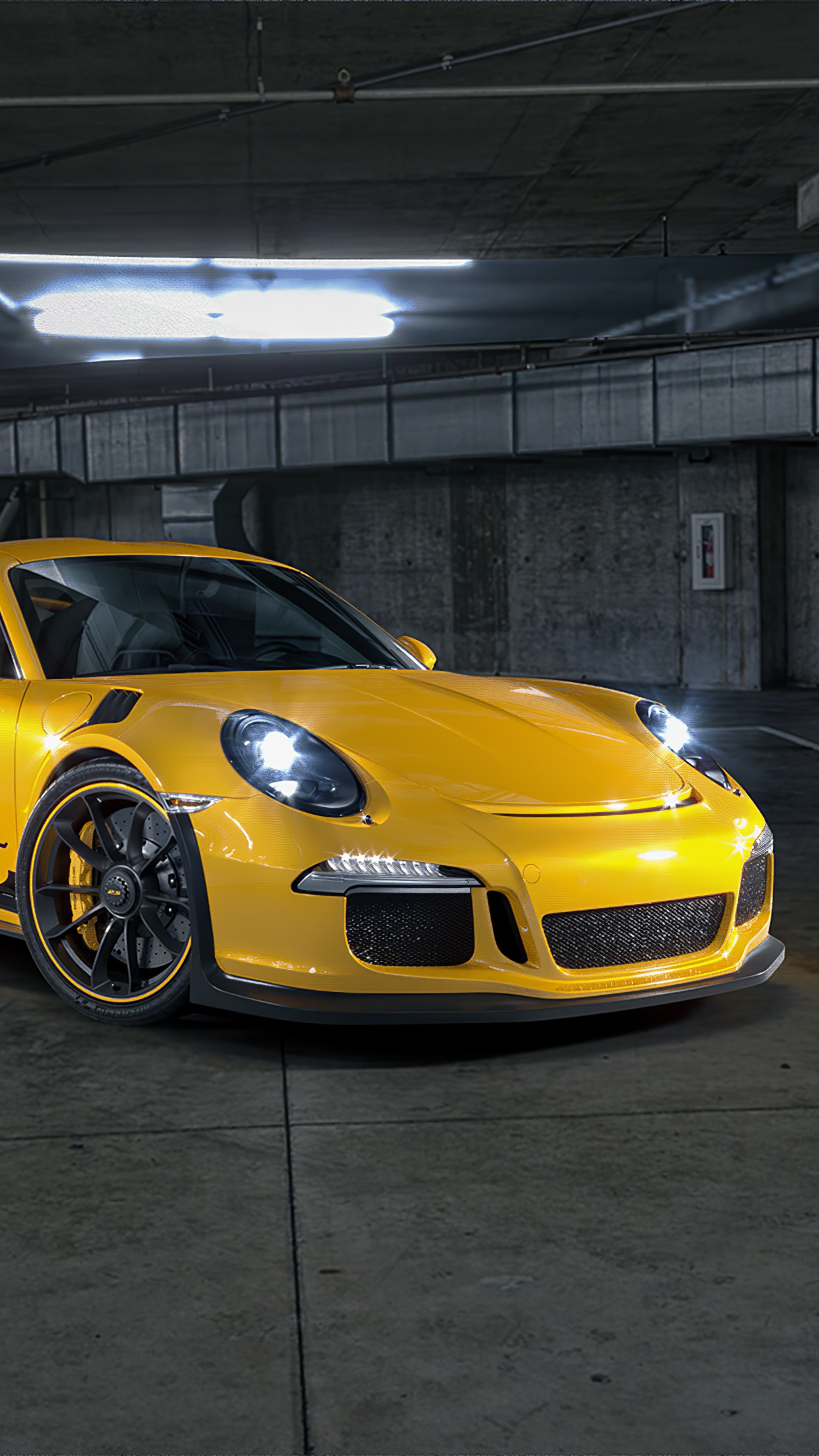 Yellow Porsche 911 GT3 in parking garage HD Phone Wallpaper