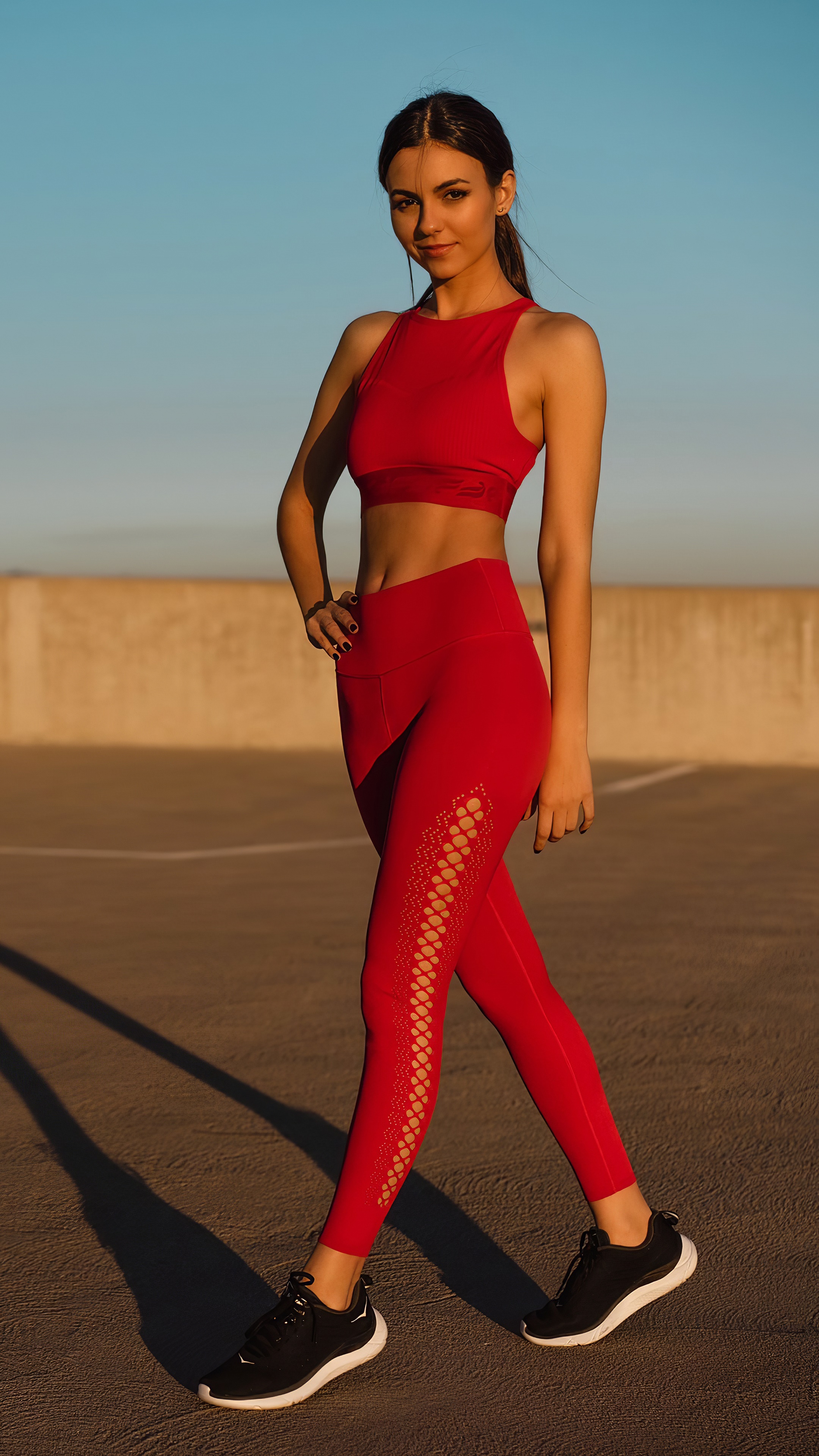 Victoria Justice in red athletic wear HD Phone Wallpaper