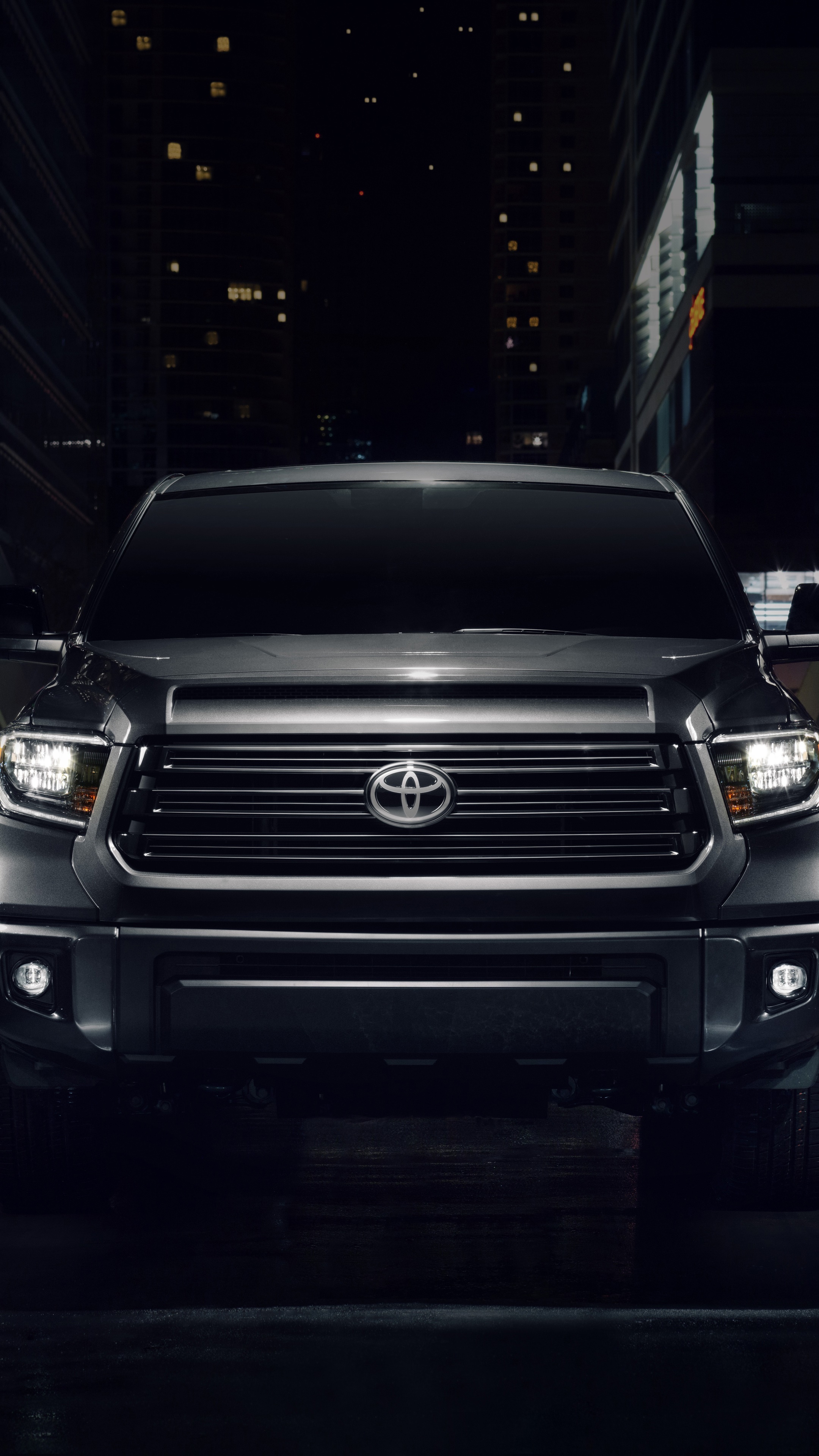 Toyota Tundra truck at night in city HD Phone Wallpaper
