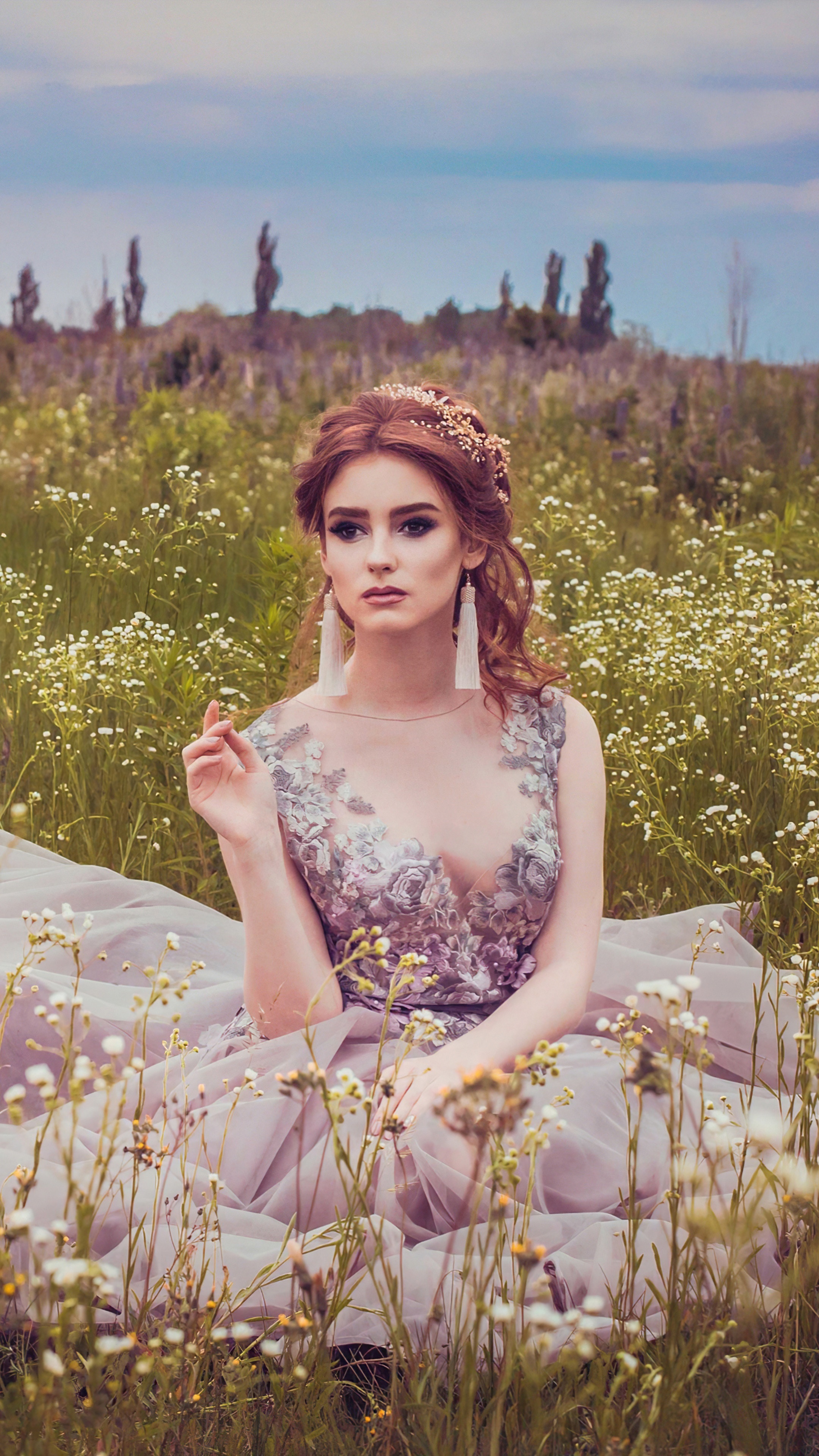 Model in a dress in a field of flowers HD Phone Wallpaper