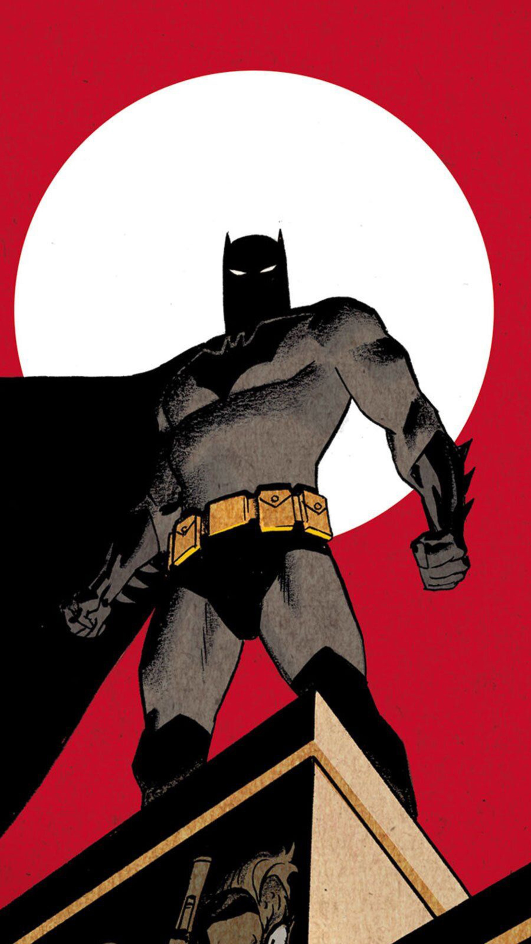 Batman standing on a rooftop with a large moon behind him HD Phone Wallpaper