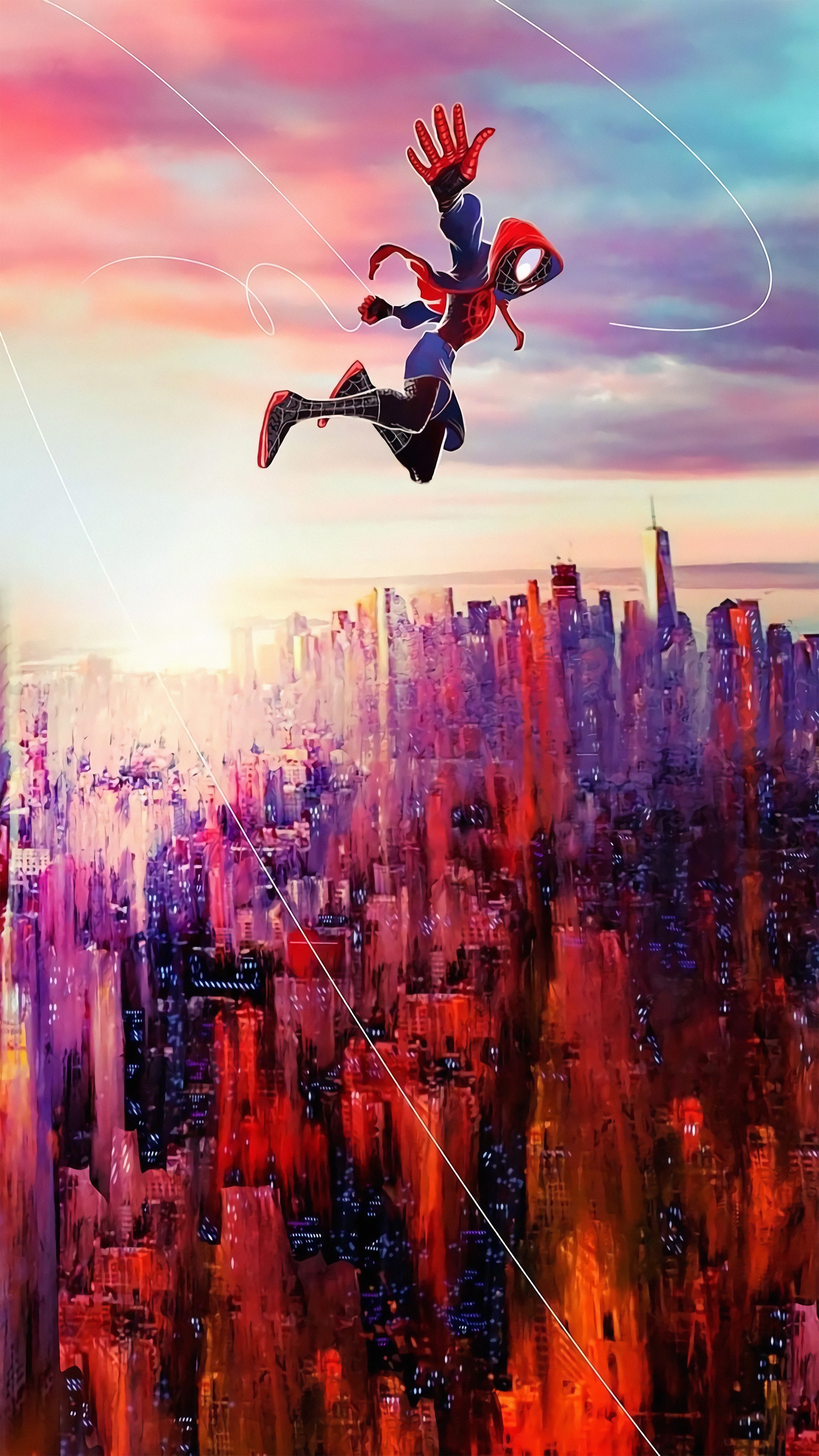 Spider-Man Miles Morales jumping over a city at sunset HD Phone Wallpaper