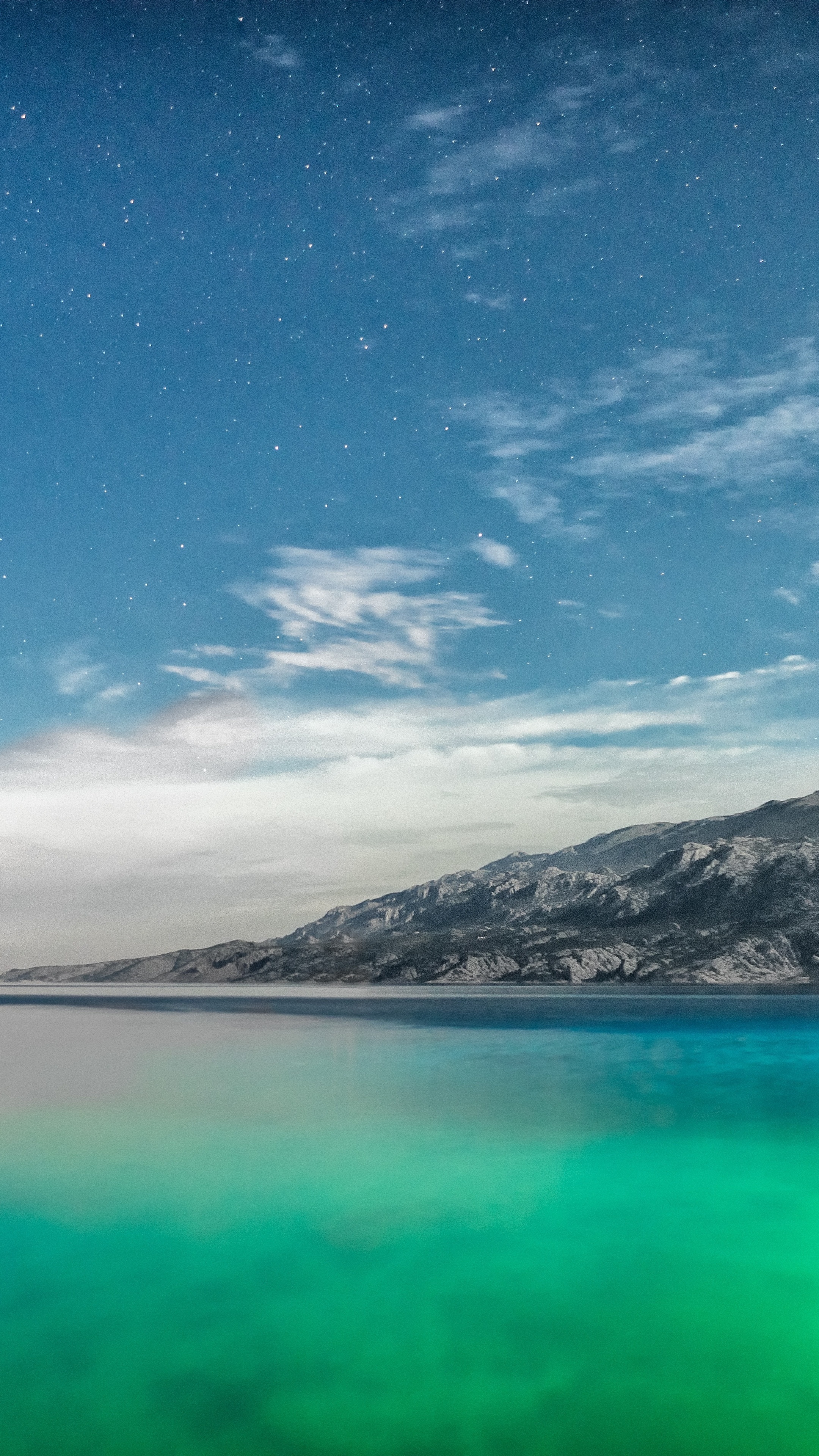Mountains and sea under a starry sky HD Phone Wallpaper