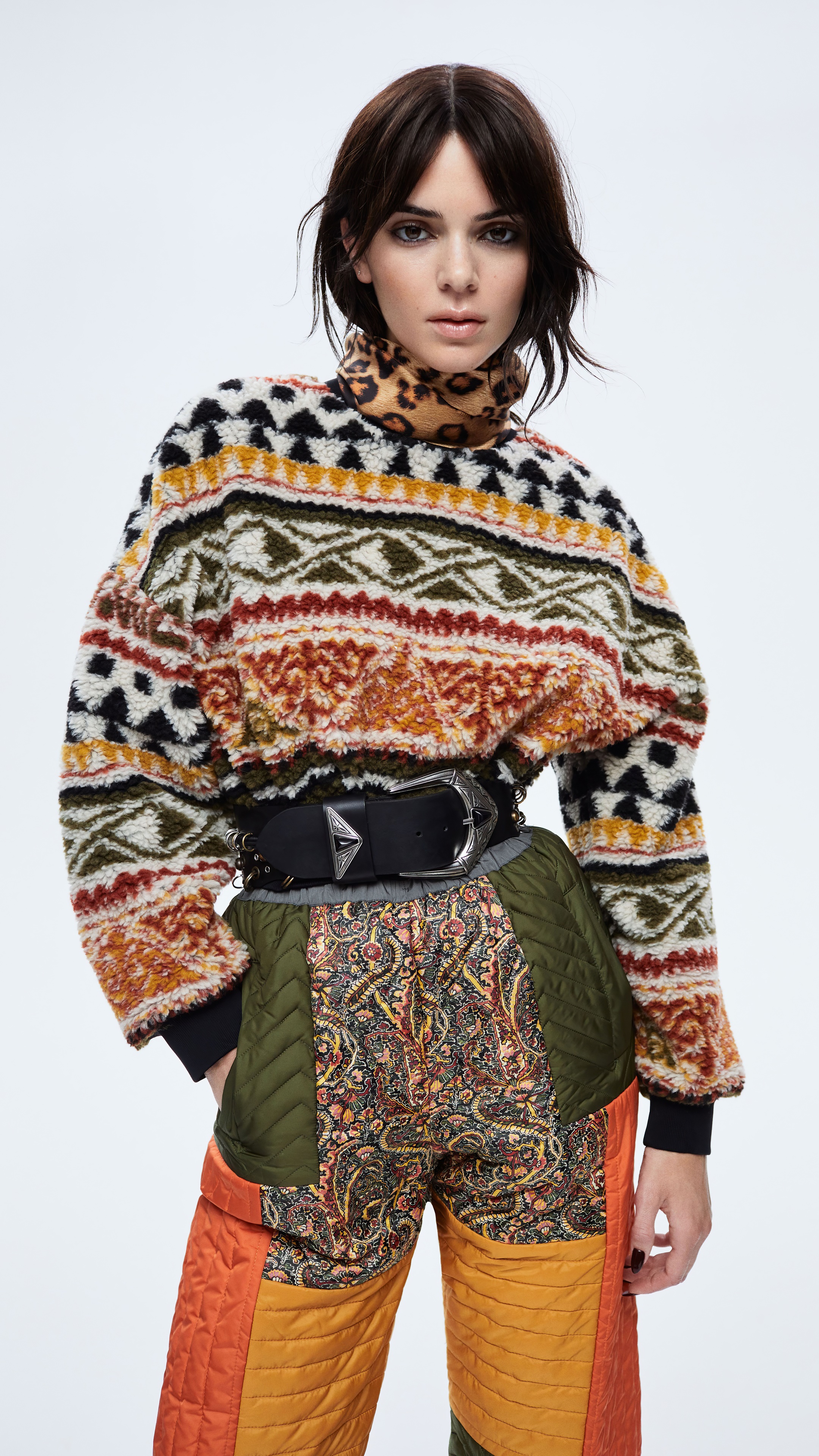 Kendall Jenner in patterned sweater and patchwork pants HD Phone Wallpaper