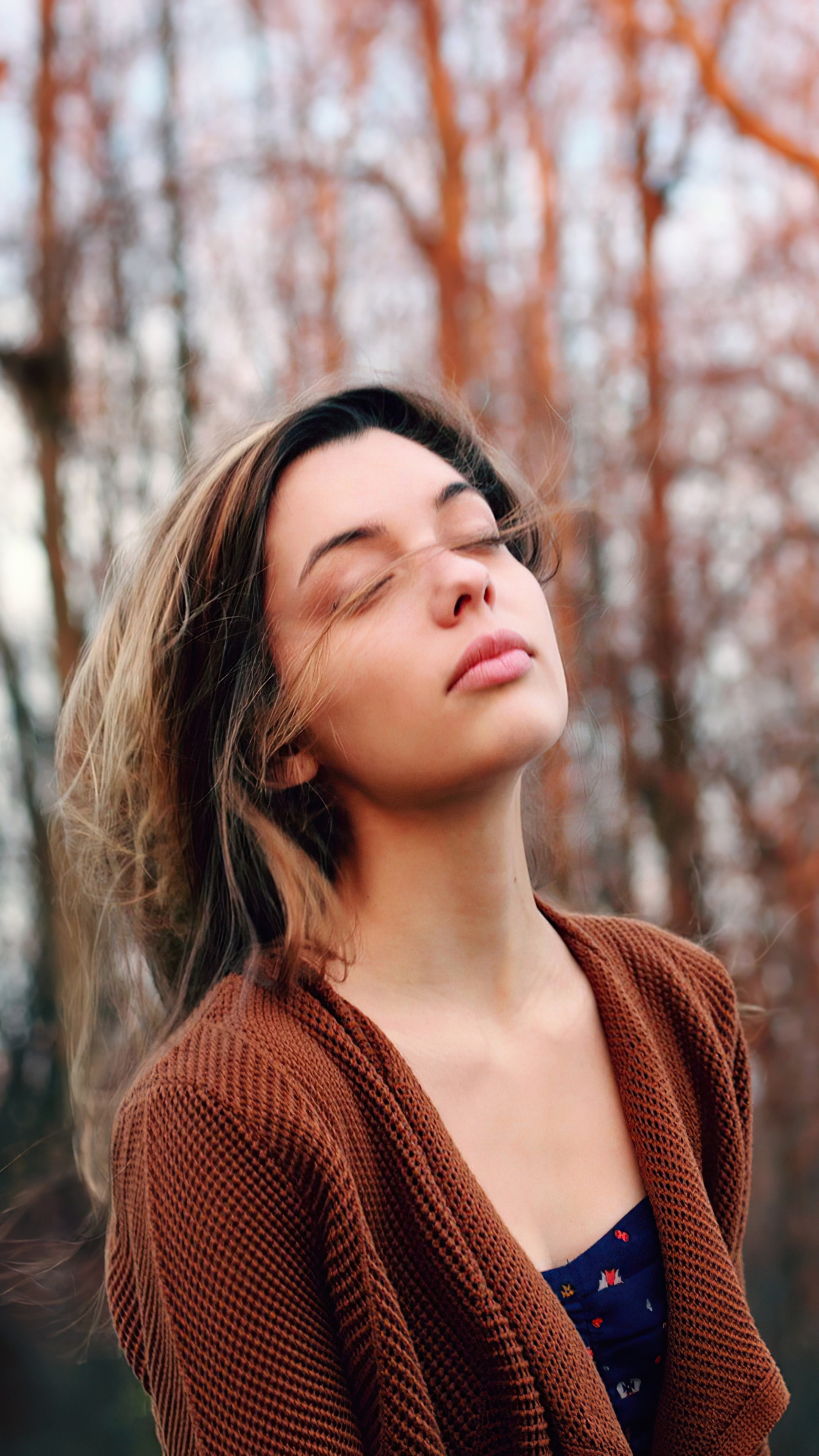 Girl with eyes closed in a brown cardigan HD Phone Wallpaper