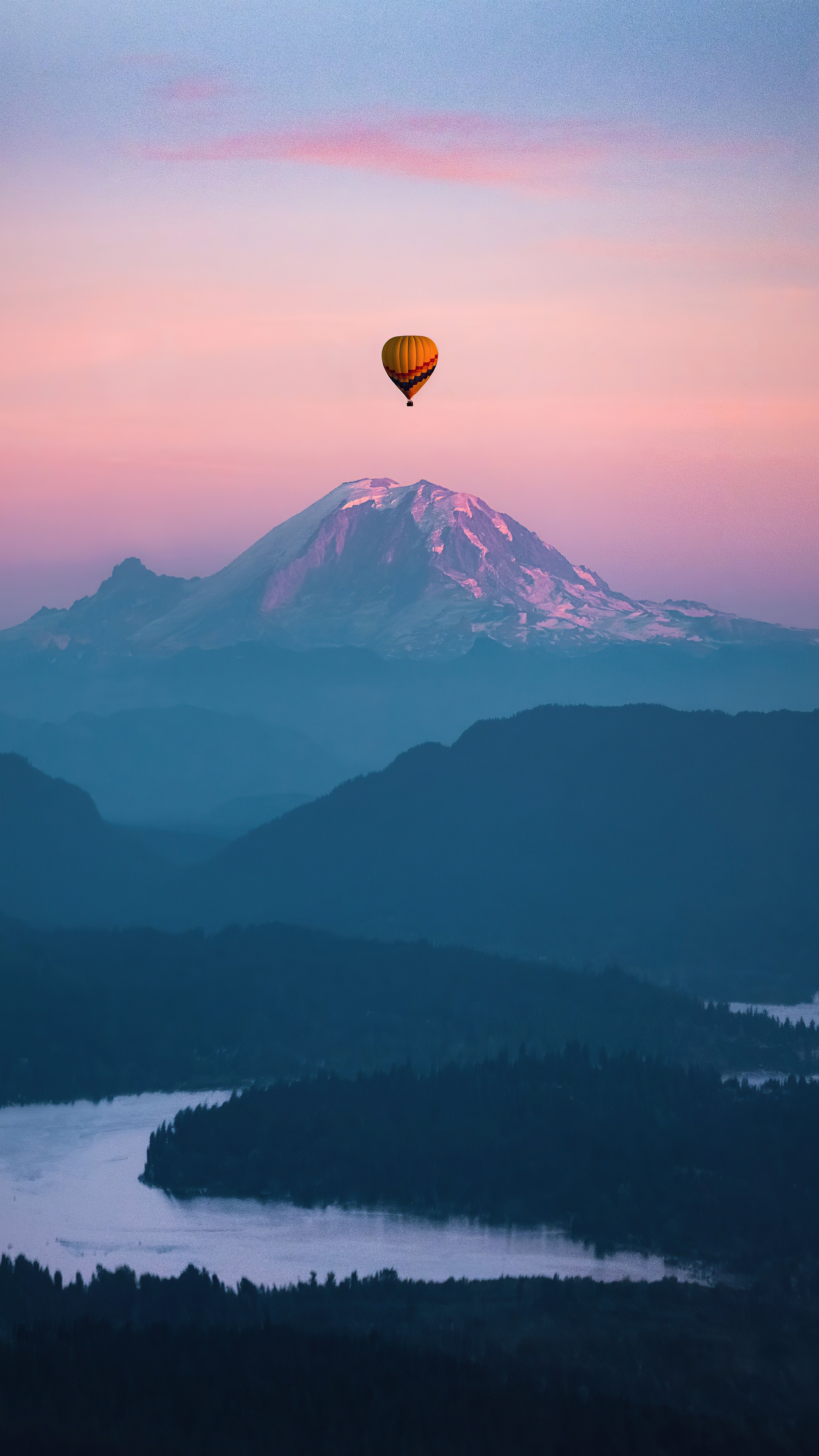 Hot air balloon over mountain and river HD Phone Wallpaper
