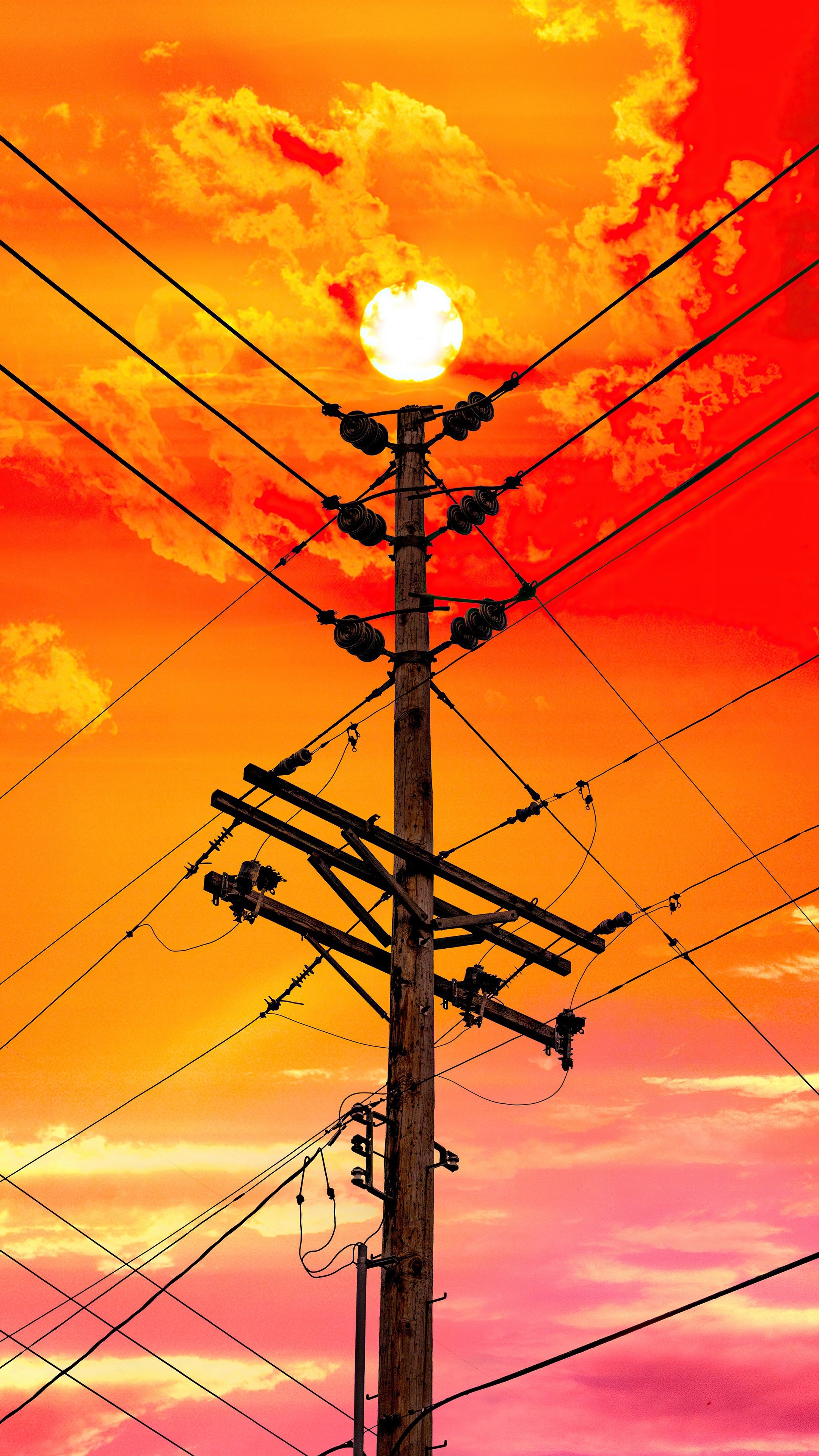 Telephone pole against a fiery sunset HD Phone Wallpaper