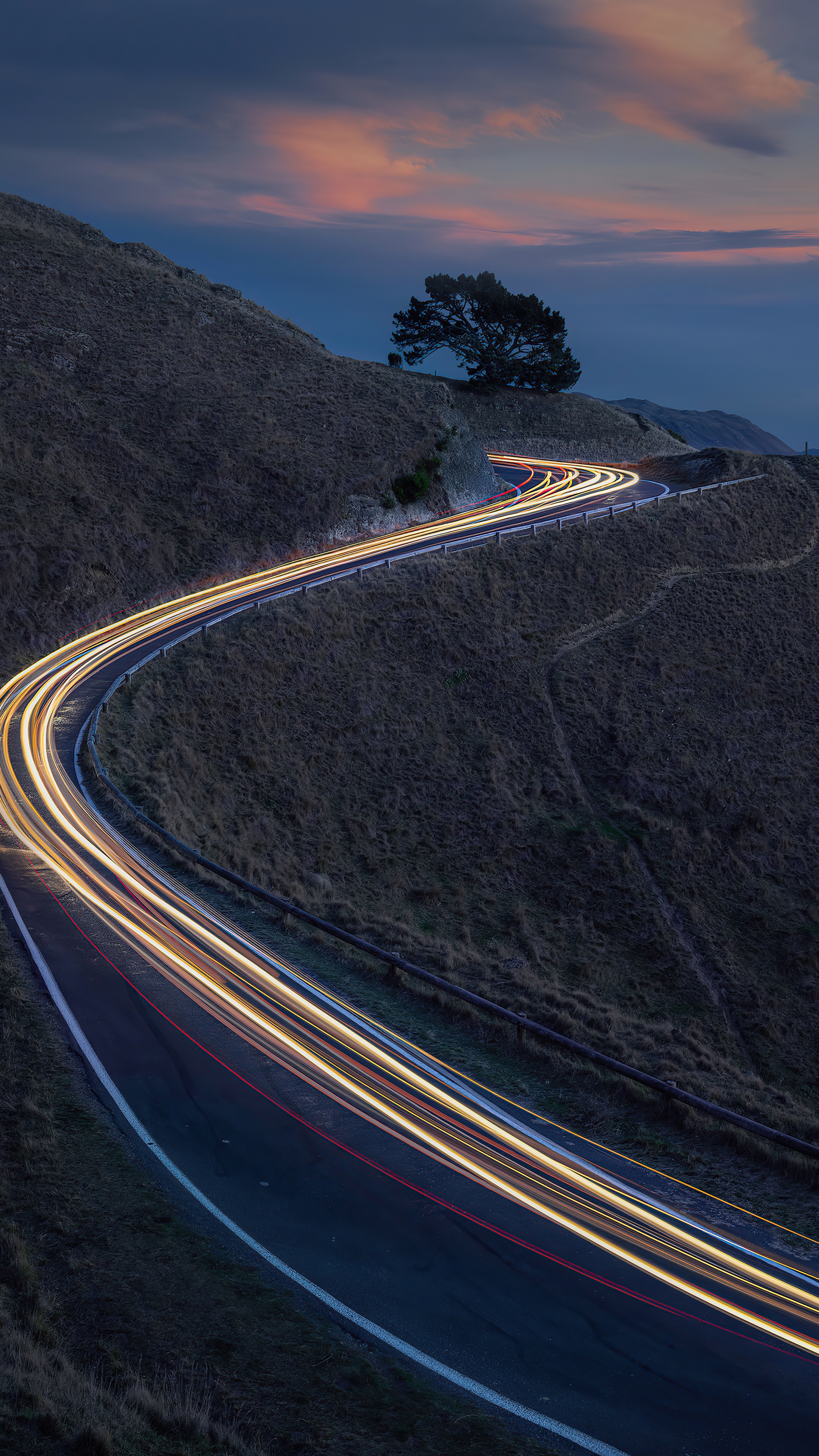 Long exposure of a winding road at dusk HD Phone Wallpaper