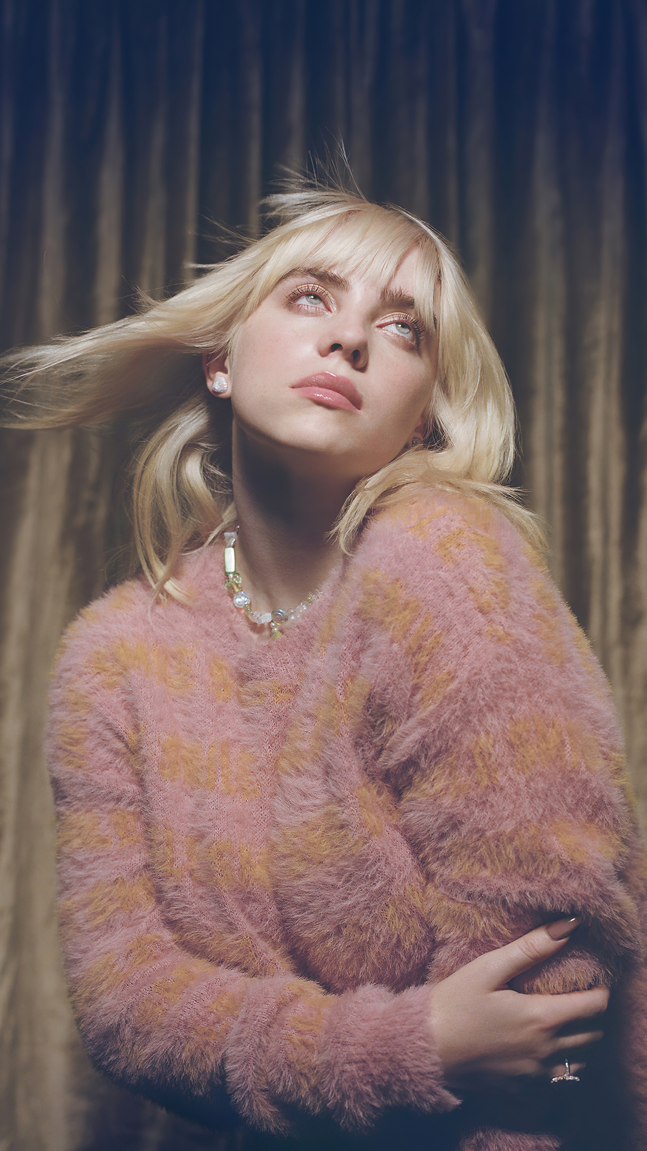 Billie Eilish wearing a pink sweater HD Phone Wallpaper