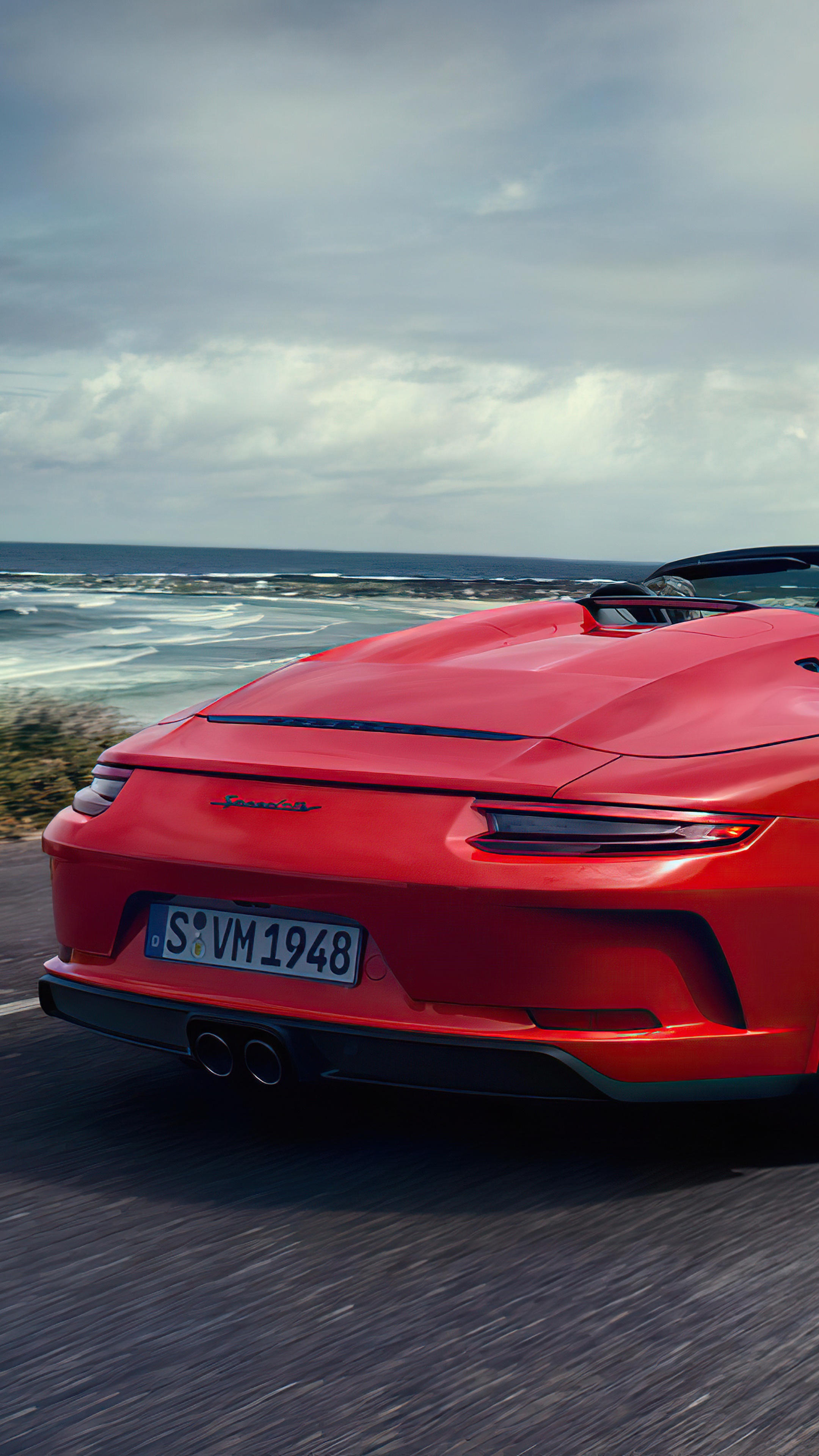 Red Porsche 911 Speedster driving by the ocean HD Phone Wallpaper
