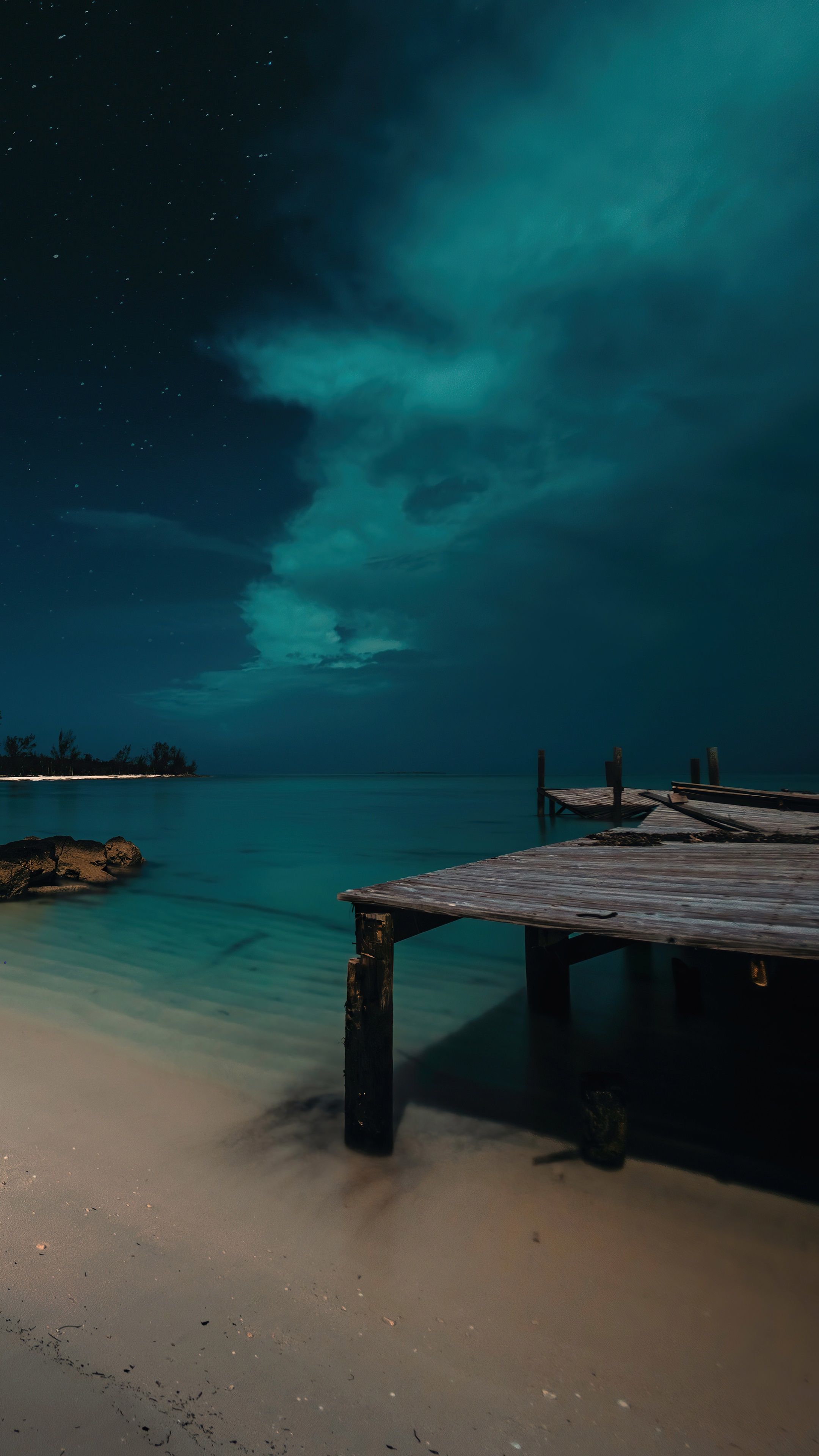 Wooden pier on a beach at night HD Phone Wallpaper