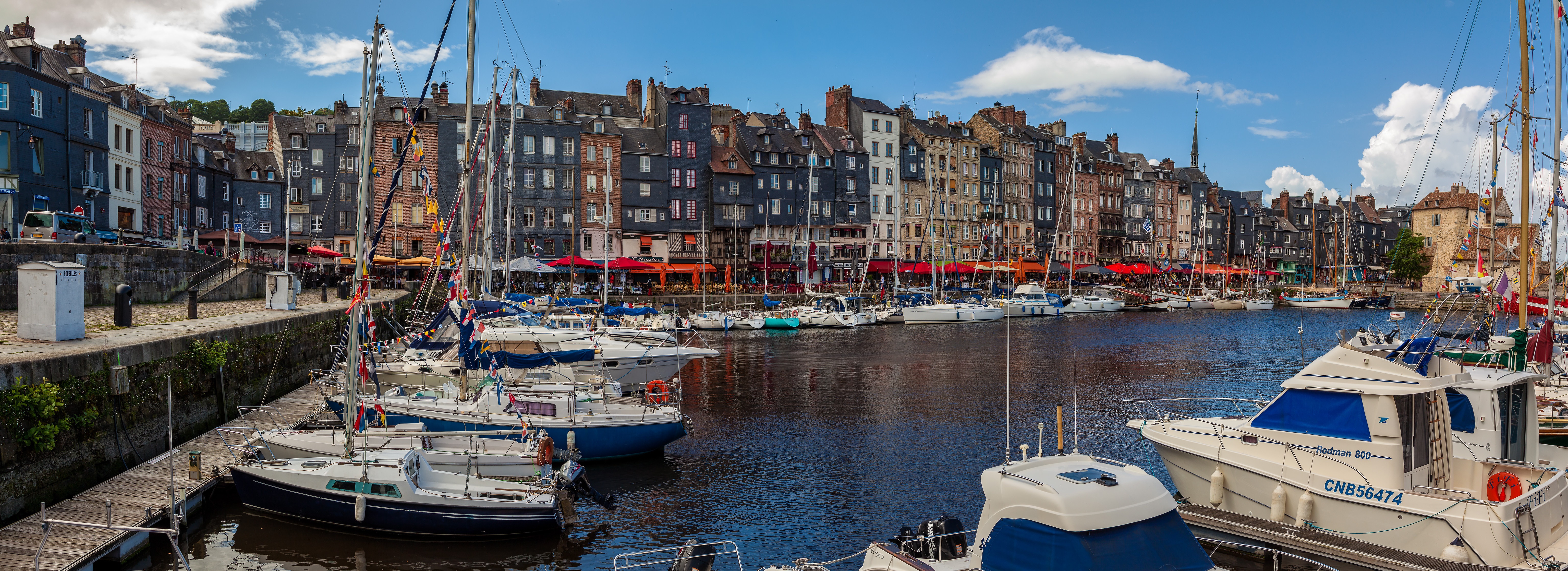 Honfleur Marina with colorful houses and yachts HD Wallpaper