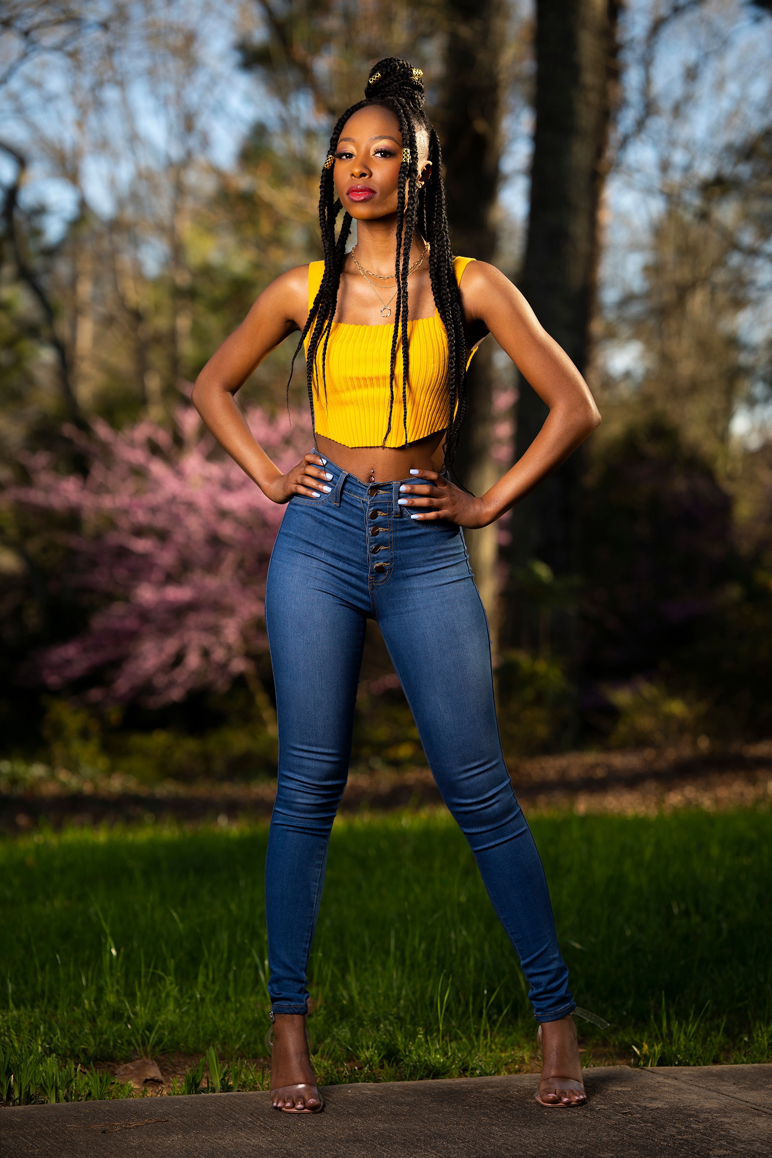 Janae Fulton posing in a yellow crop top and jeans HD Phone Wallpaper