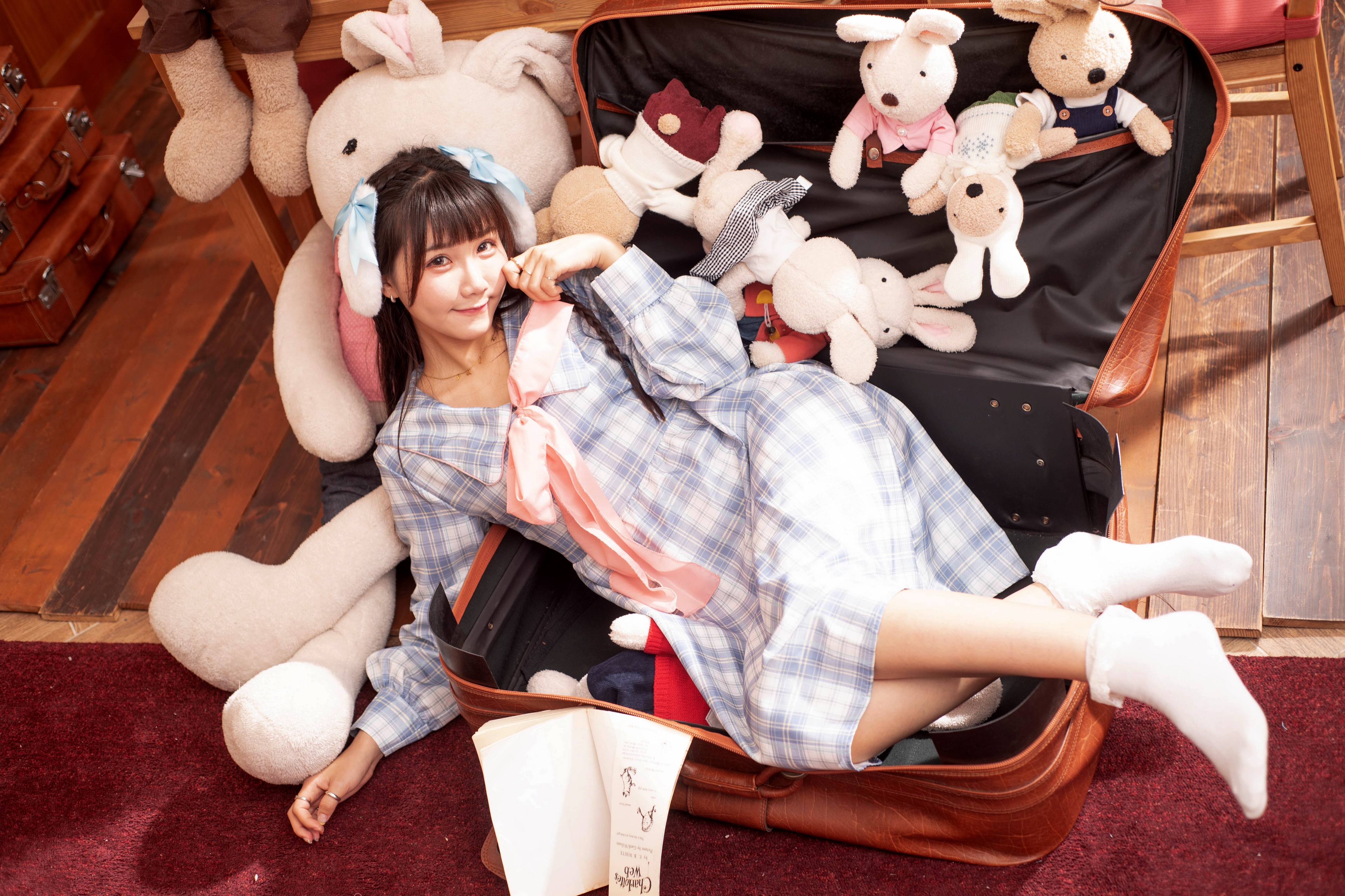 Asian Girl with Toys in Suitcase HD Wallpaper