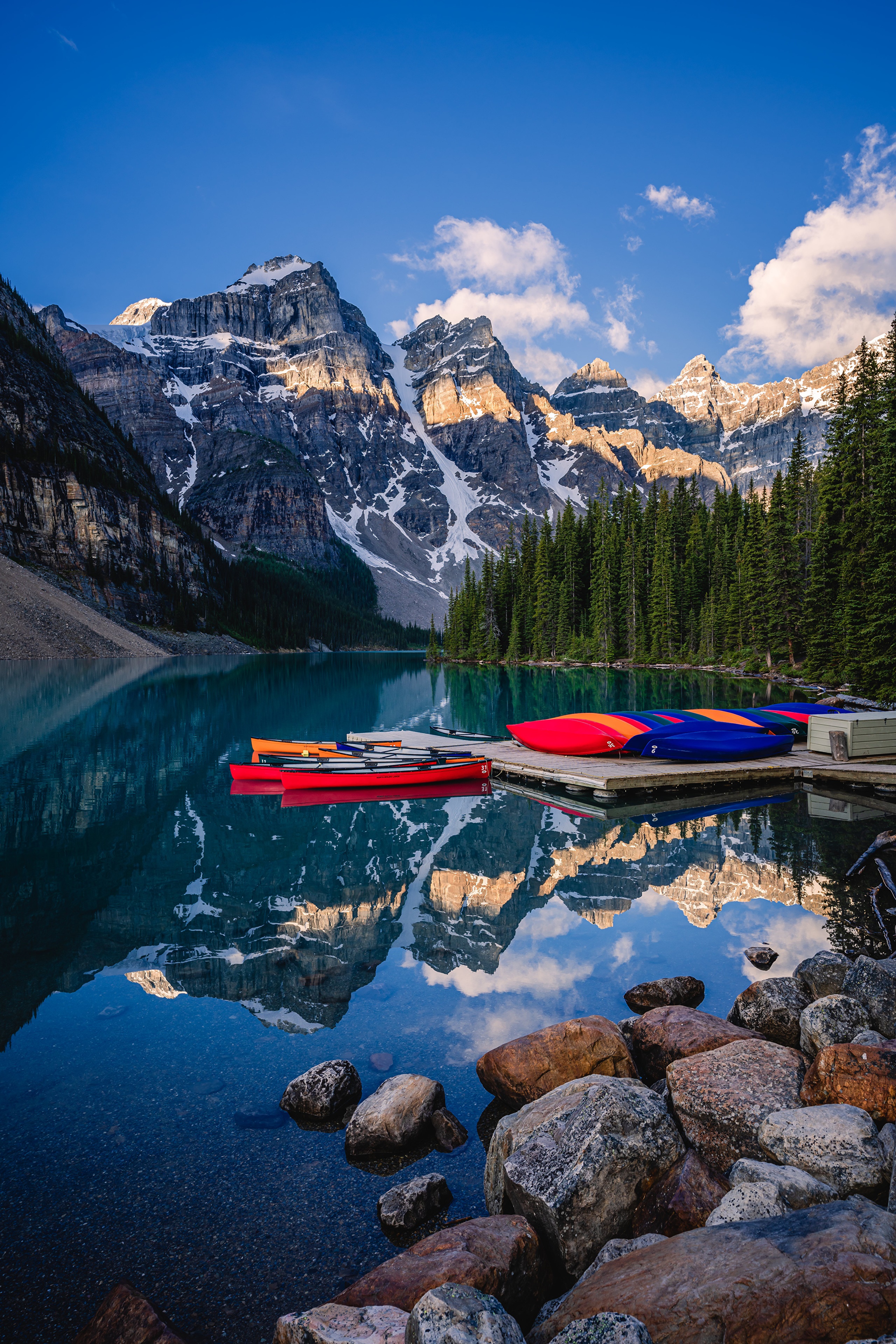 Moraine Lake with Canoes and Mountains in Banff National Park HD Phone Wallpaper