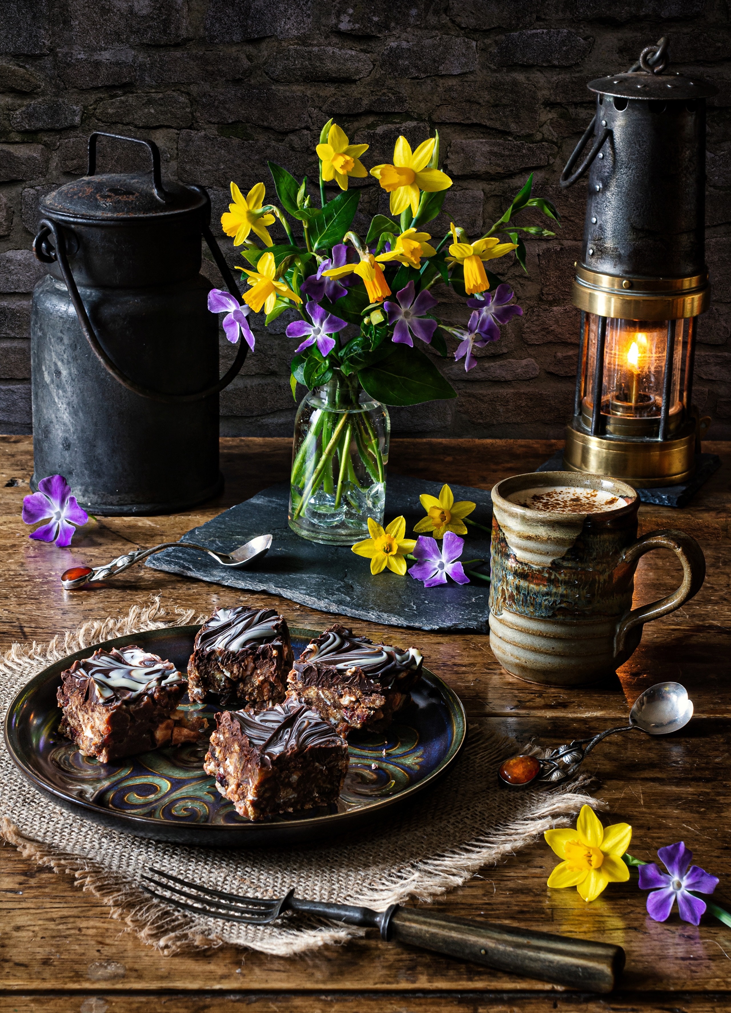 Still-life with cakes, daffodils, and a kerosene lamp HD Phone Wallpaper