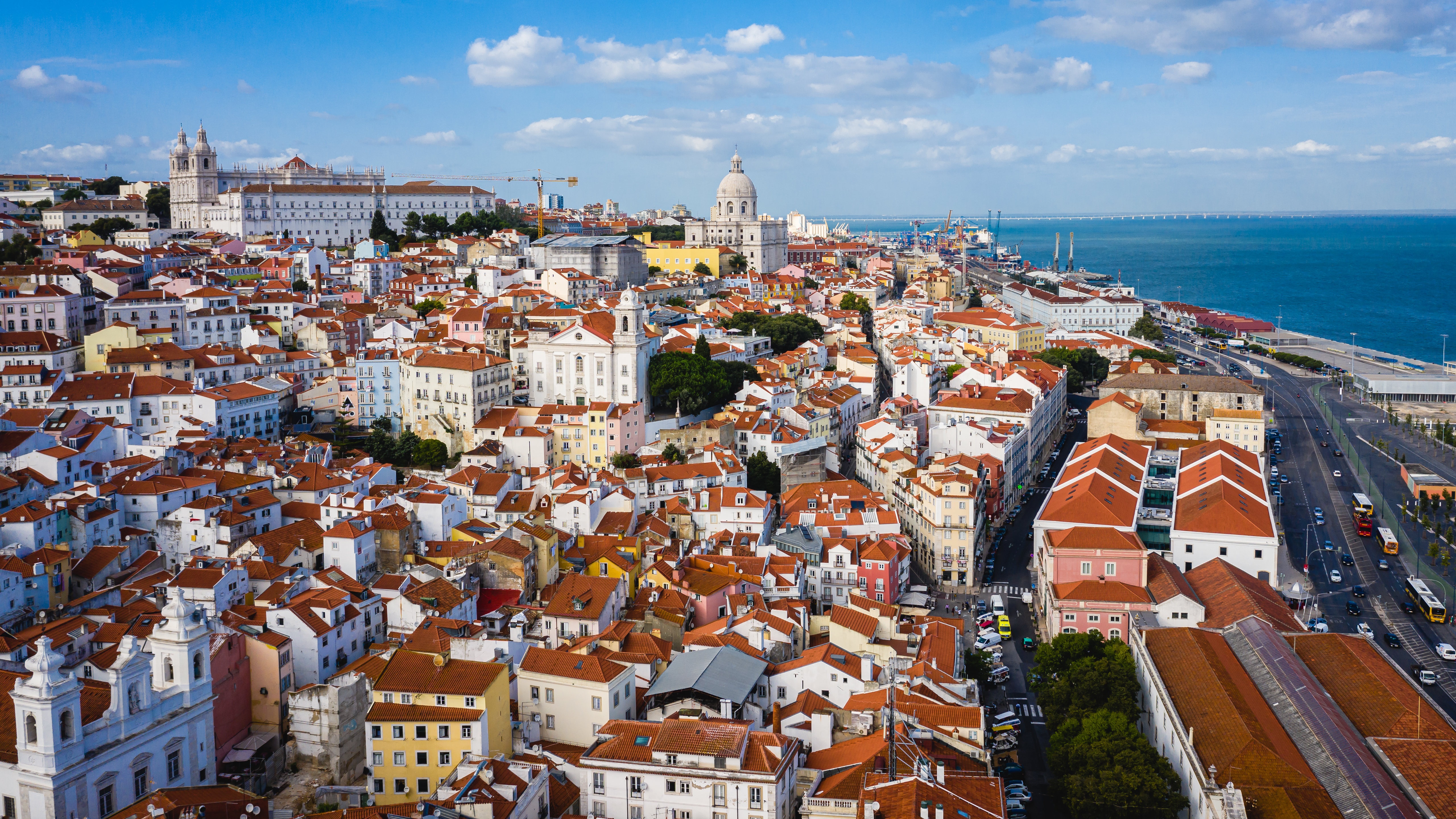Lisbon, Portugal cityscape with river and bridge HD Wallpaper