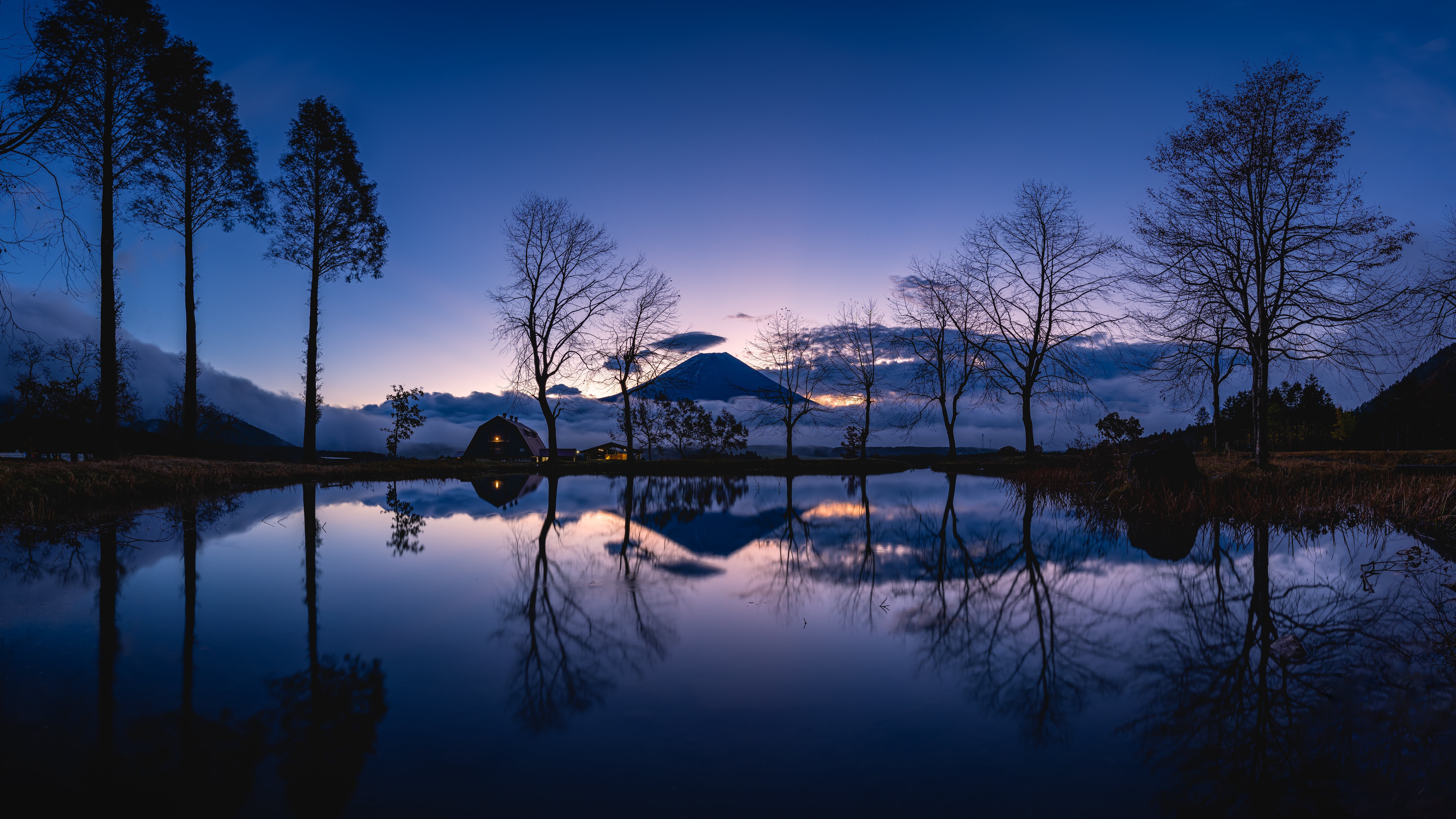 Mount Fuji reflected in a lake at dusk, Japan HD Wallpaper