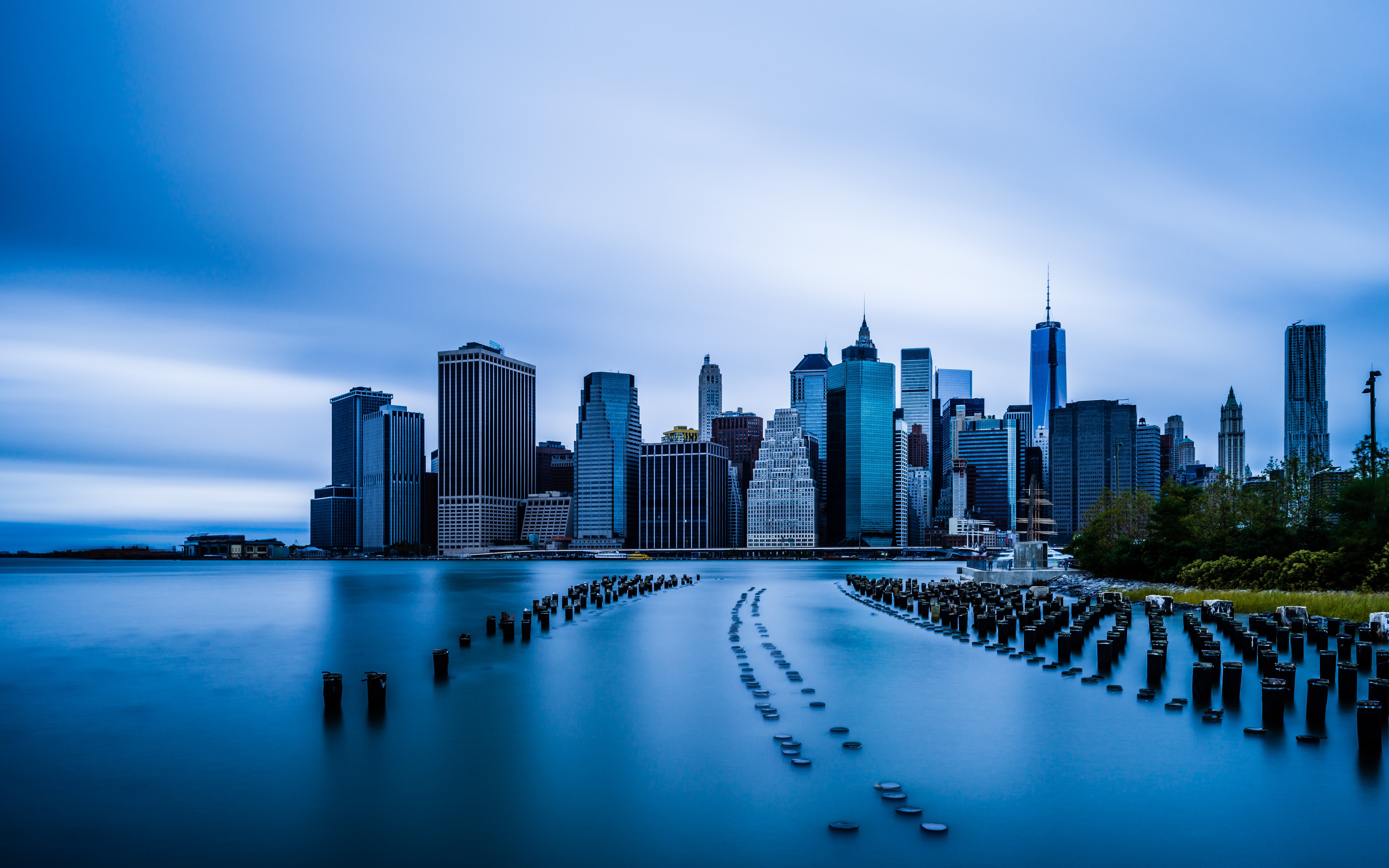 New York City skyline with Manhattan skyscrapers and water HD Wallpaper