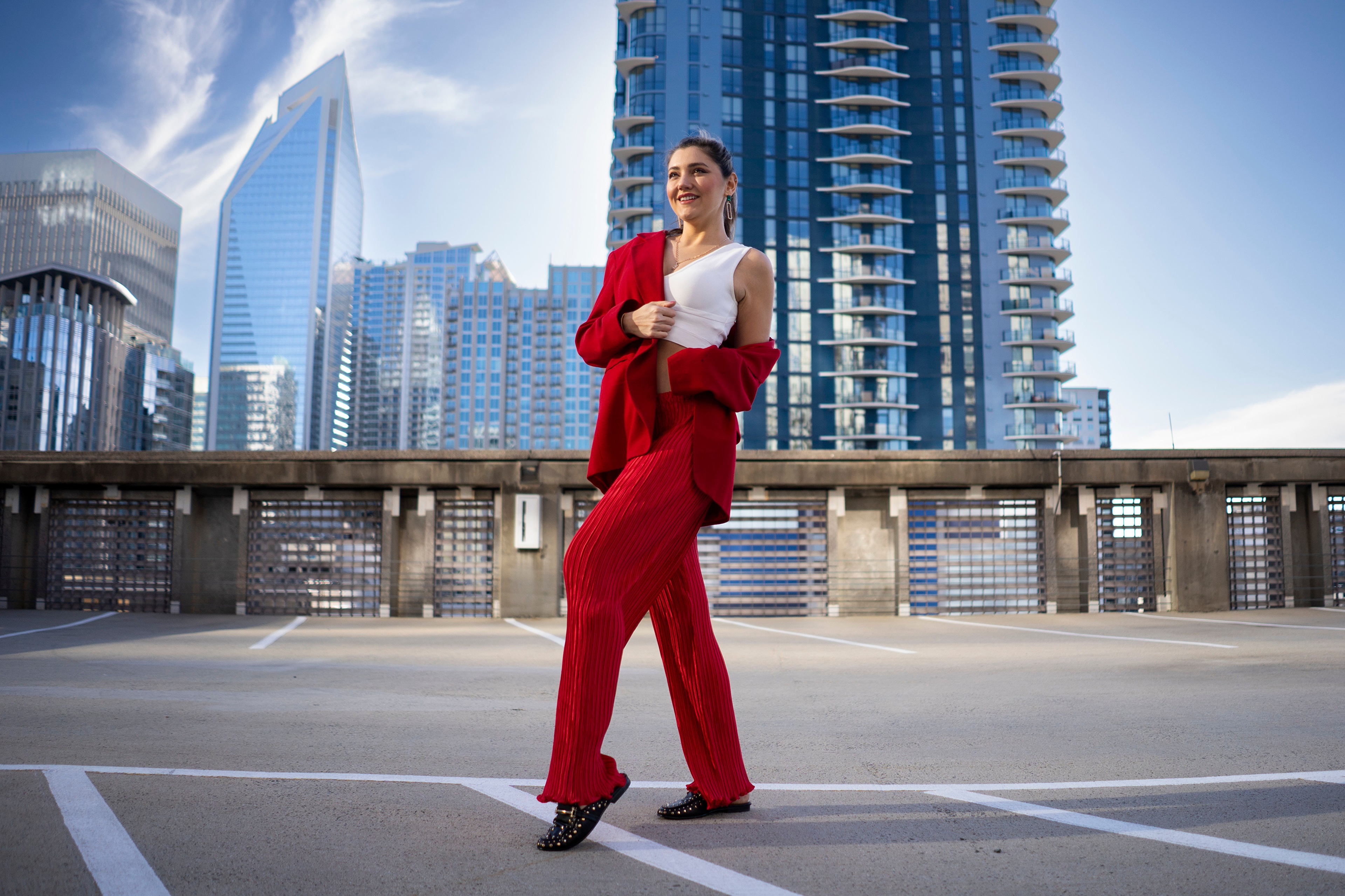 Model Tania d'Anconia in red suit HD Wallpaper