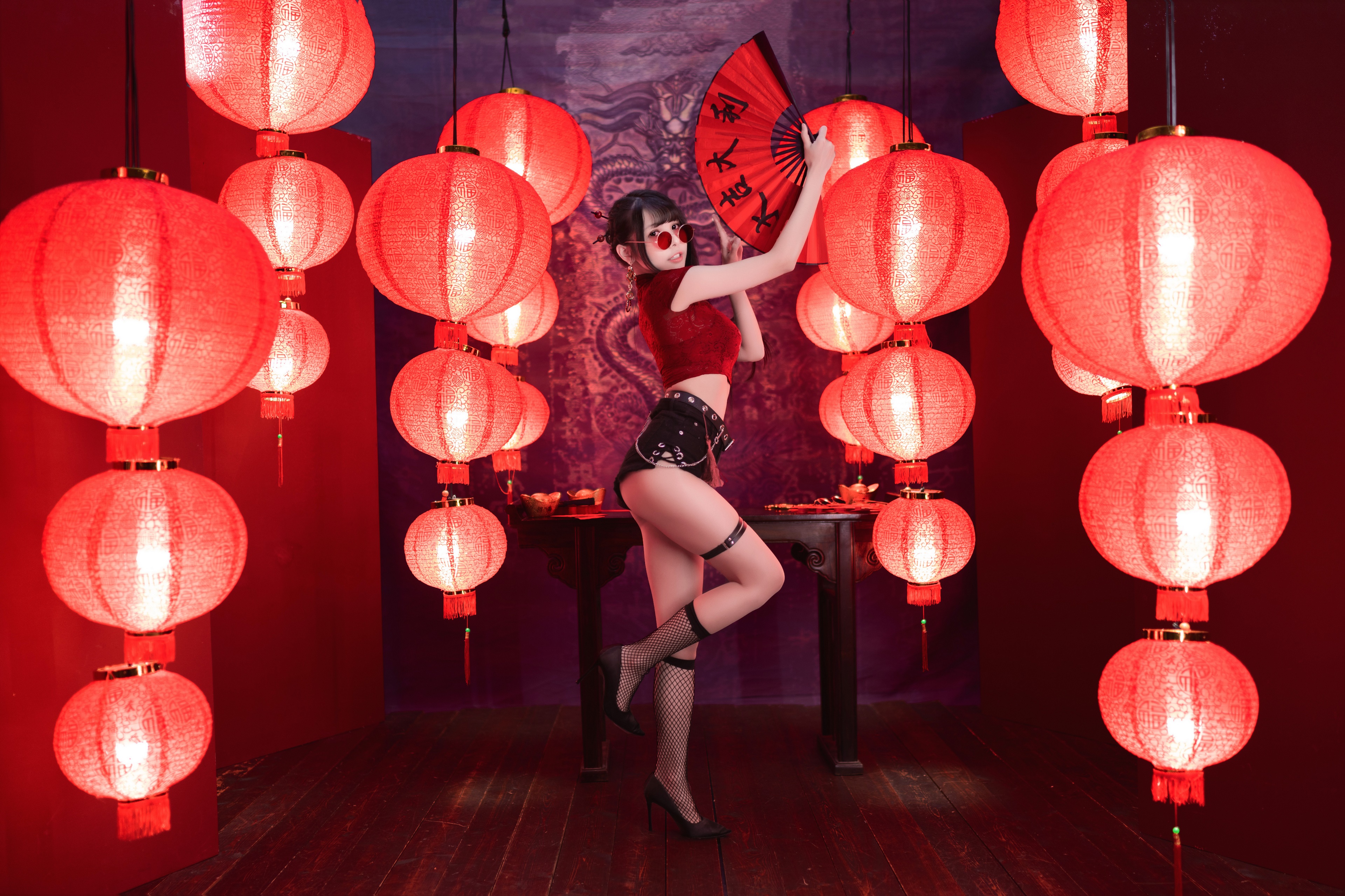 Brunette girl in shorts and blouse posing with red lanterns HD Wallpaper