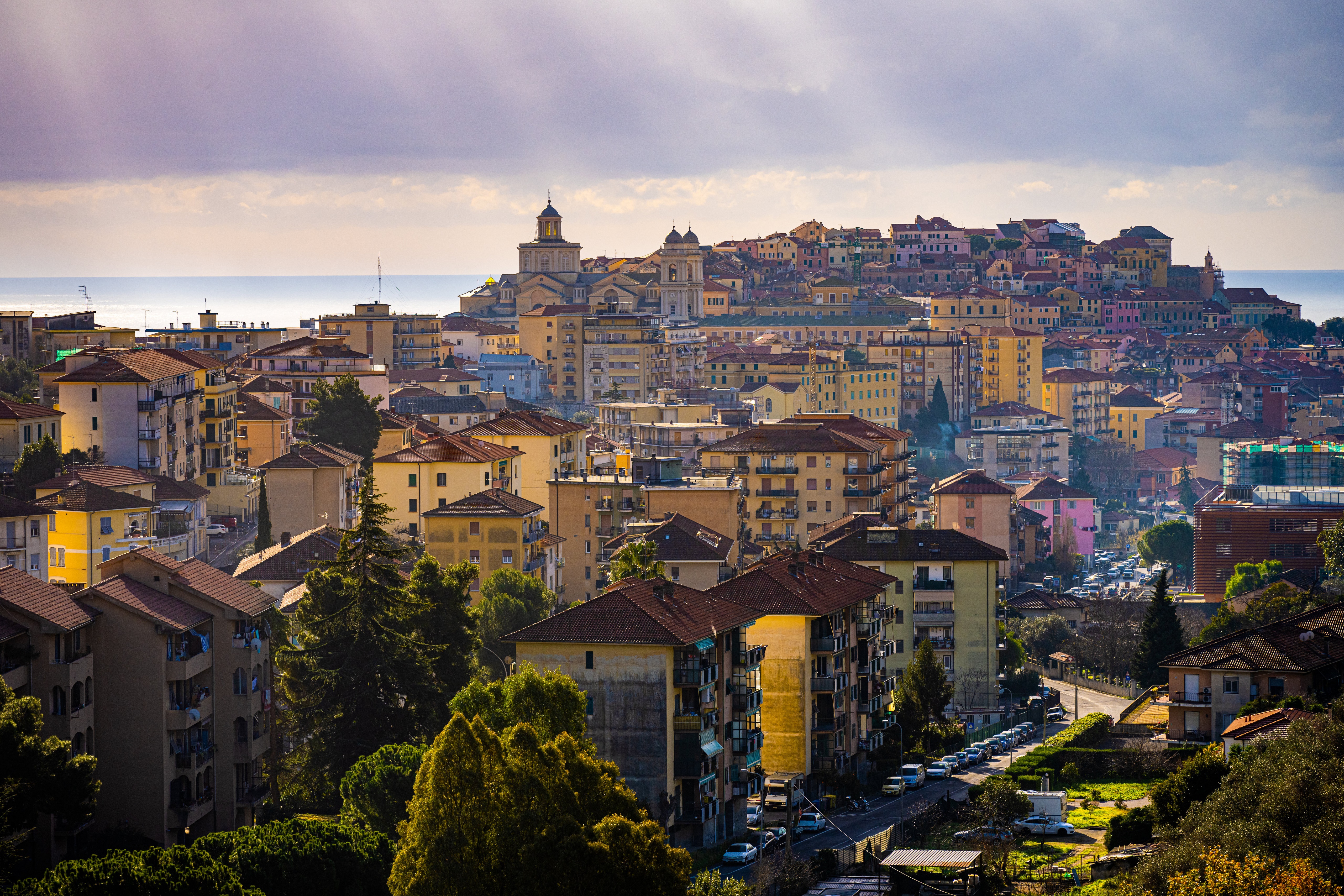 Bordighera, Liguria, Italy - Cityscape with Buildings and Sea HD Wallpaper