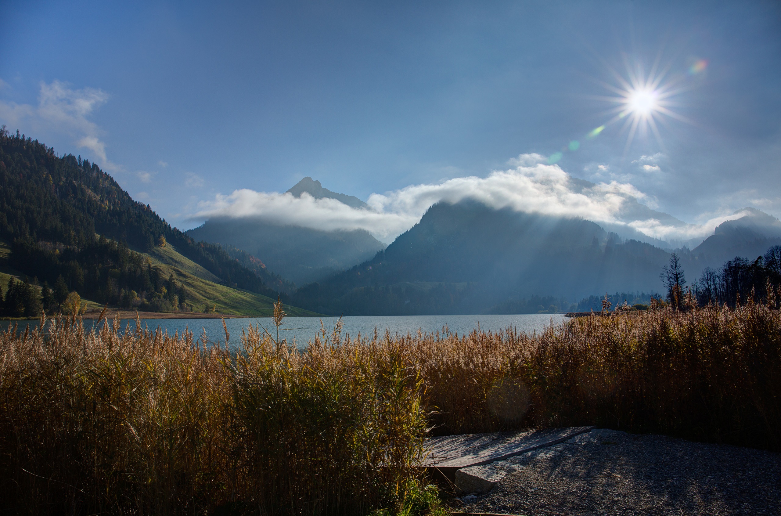 Schwarzsee Lake with Alps Mountains and Sun in Switzerland HD Wallpaper