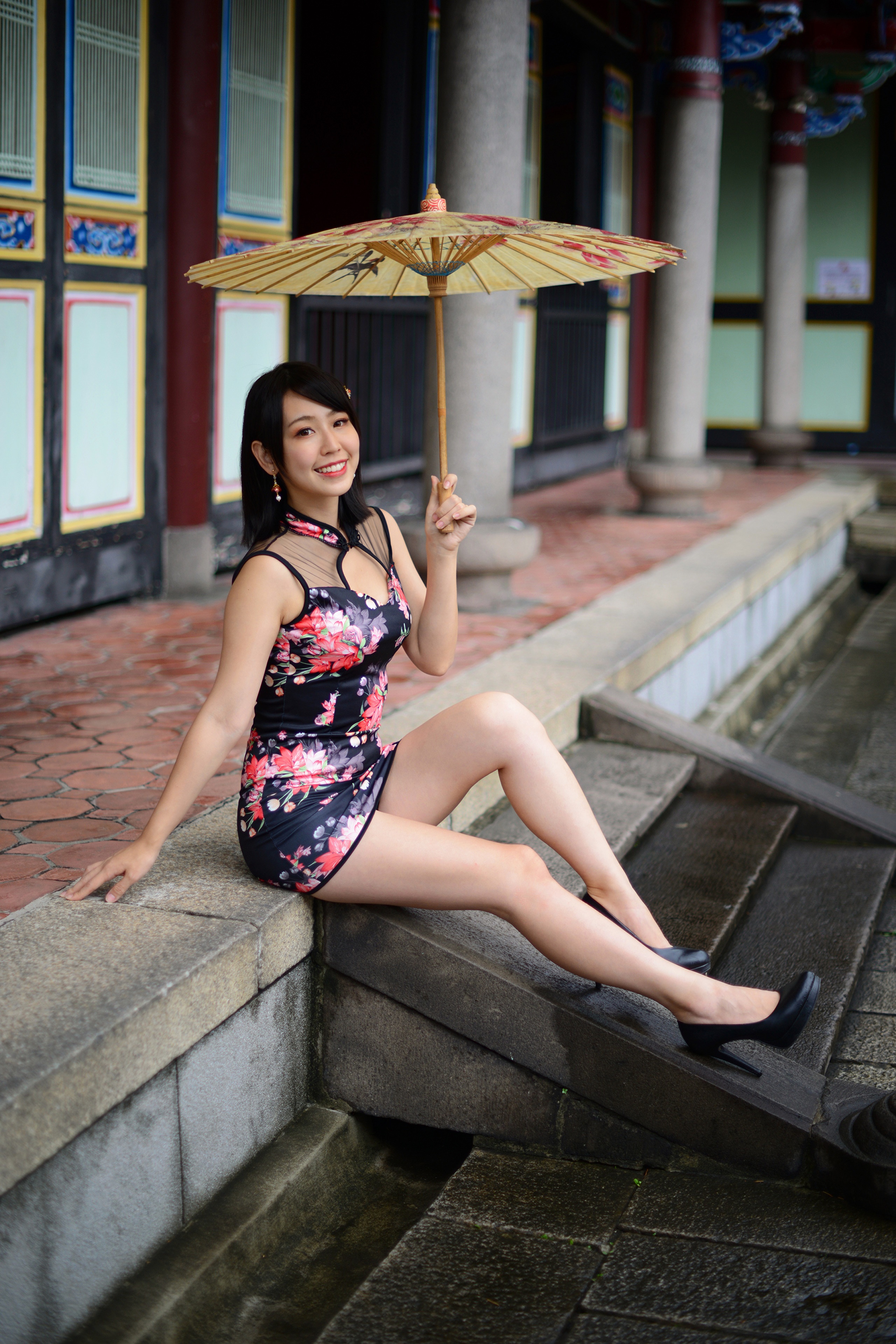 Woman in a floral dress holding an umbrella HD Phone Wallpaper