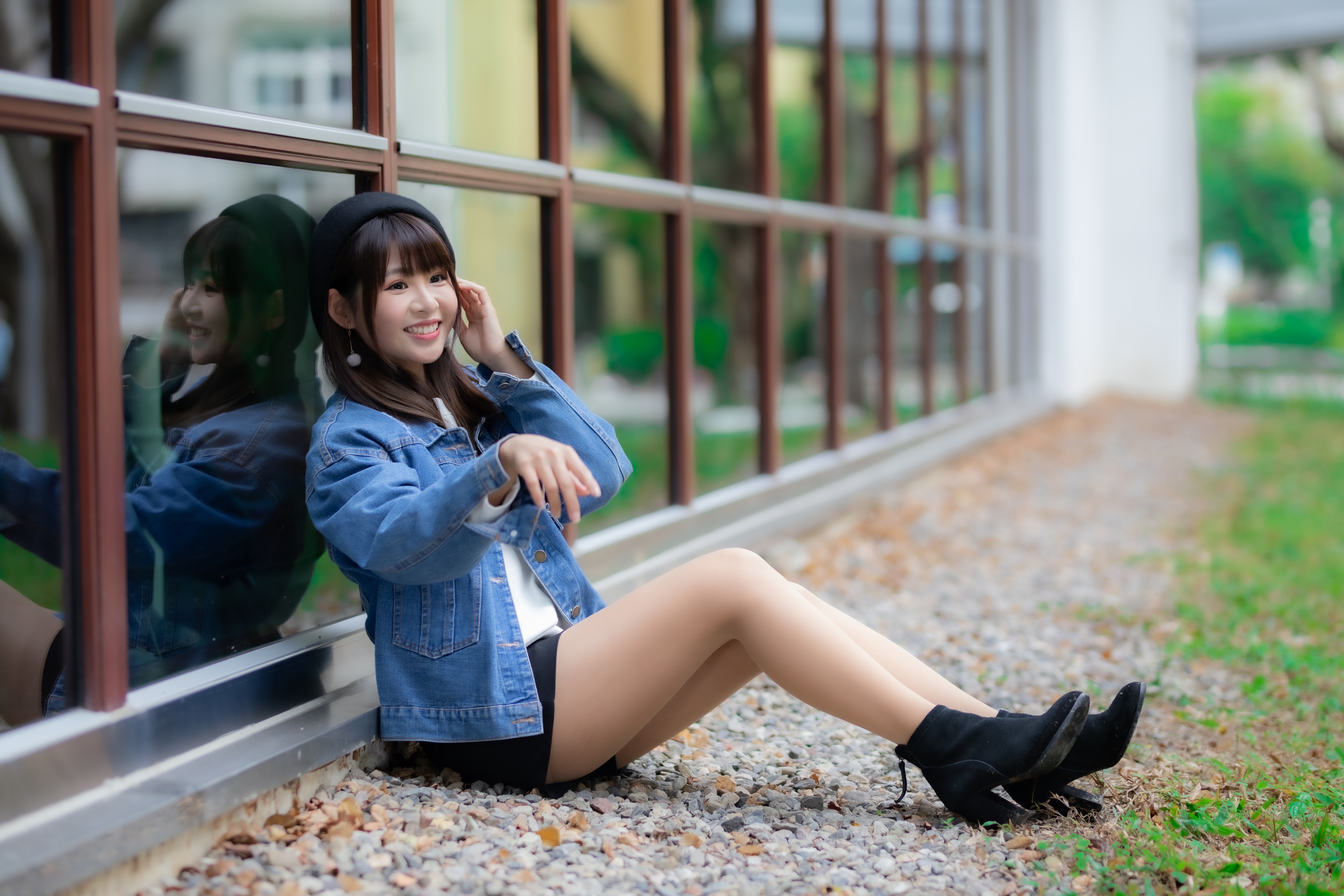 Asian girl in denim jacket and beret sitting by window HD Wallpaper