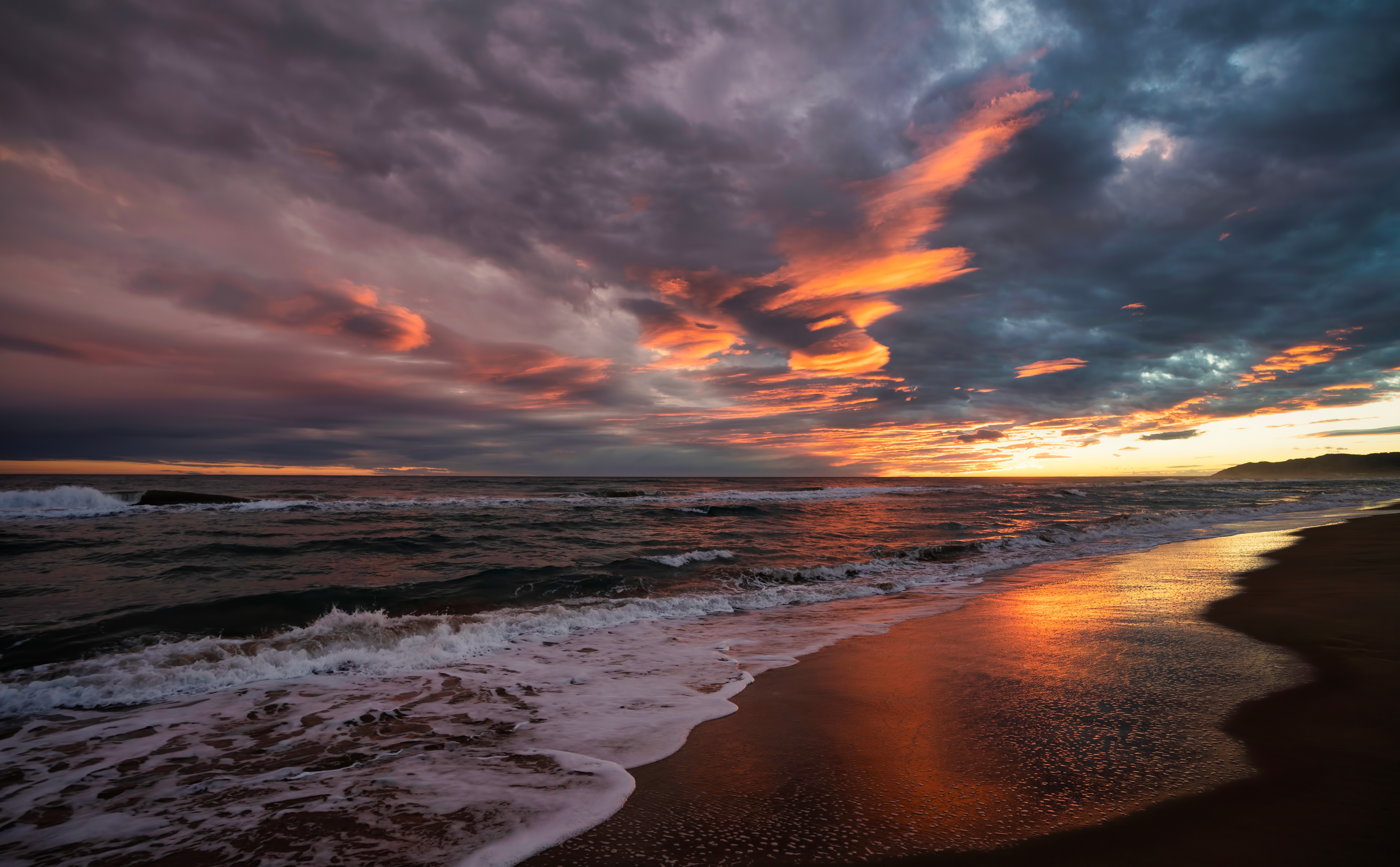 Sunset over the coast of Spain with dramatic clouds HD Wallpaper