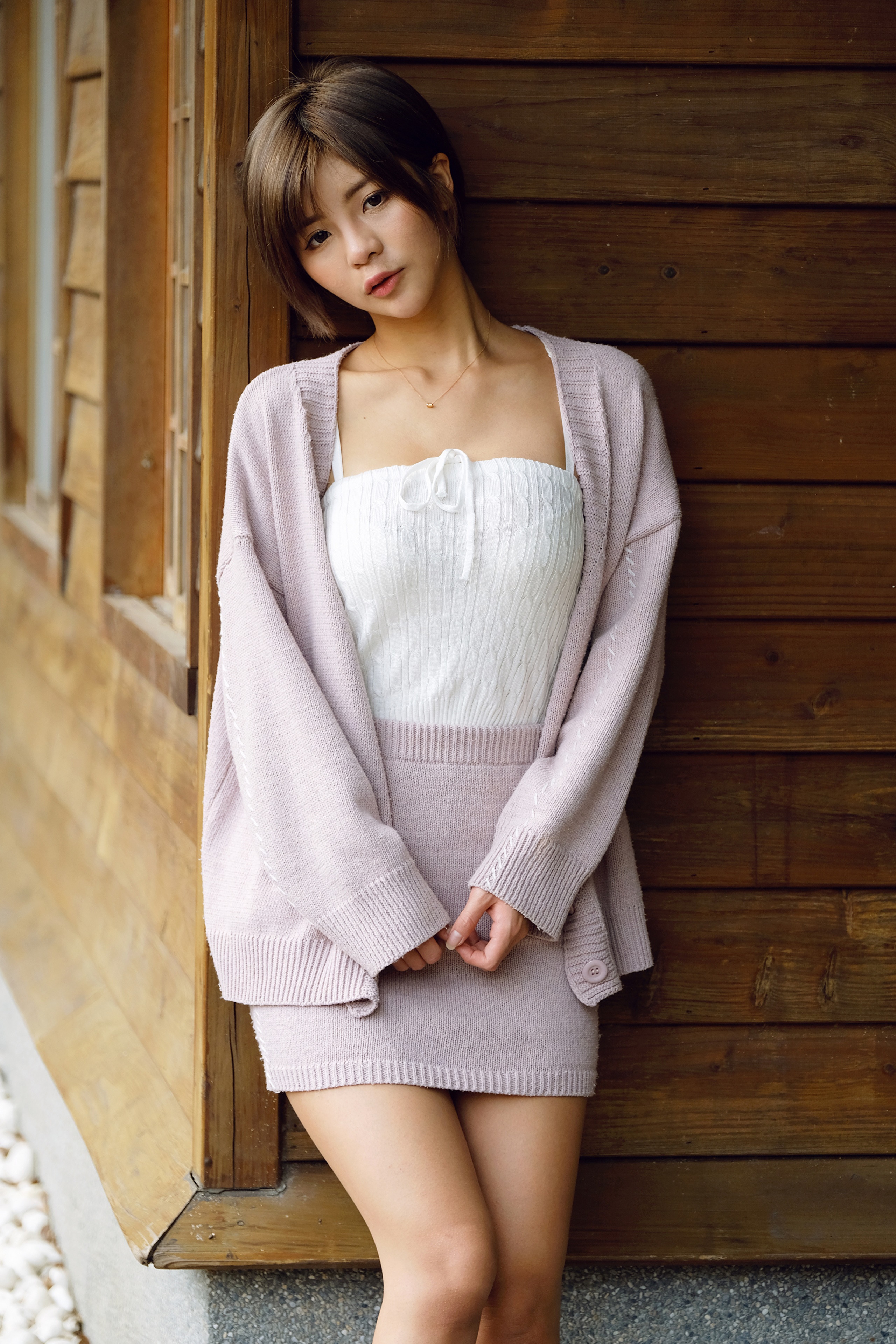 Asian woman in a pink cardigan and skirt HD Phone Wallpaper