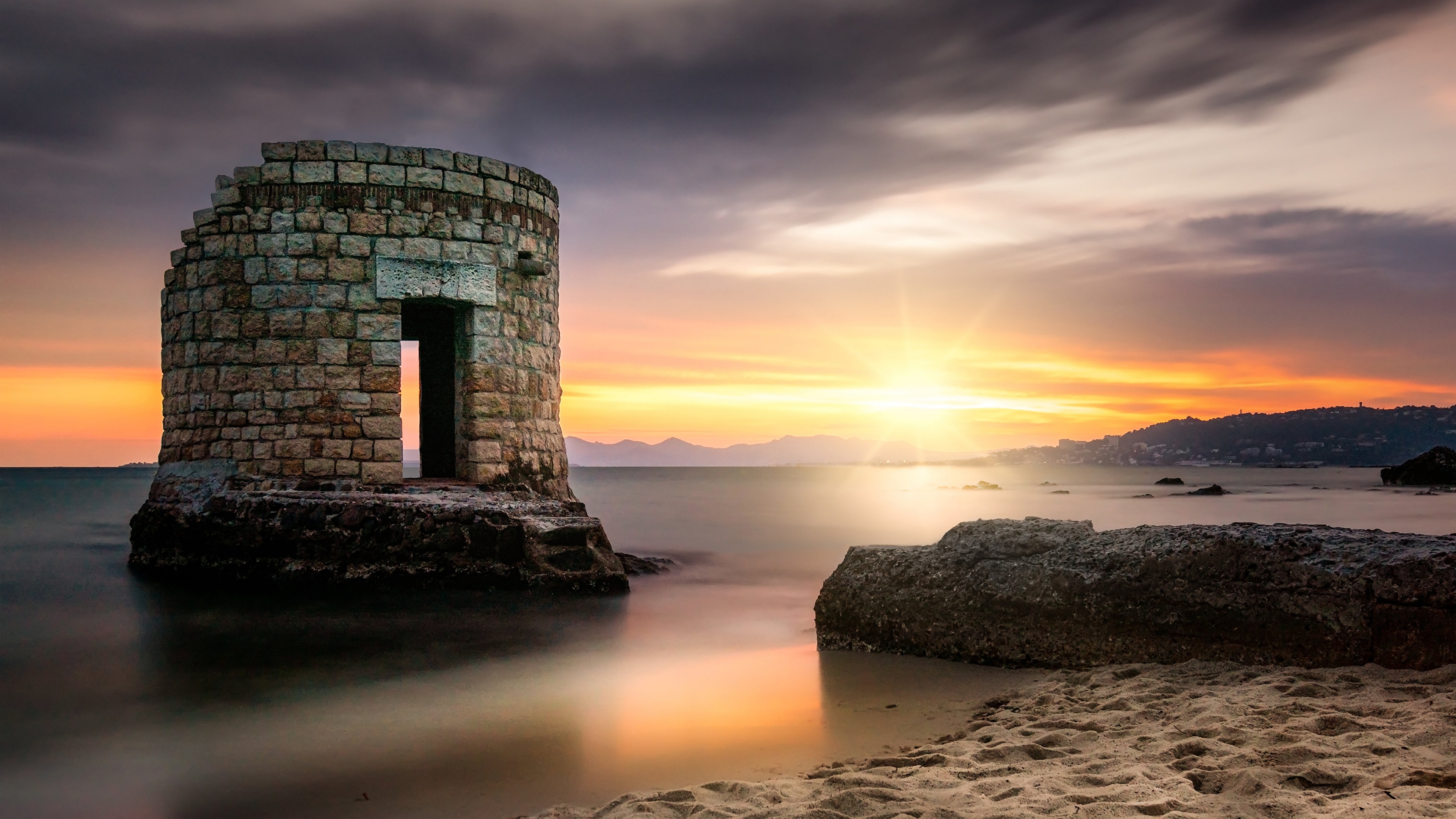 Stone tower on the coast of Antibes, France at sunset HD Wallpaper