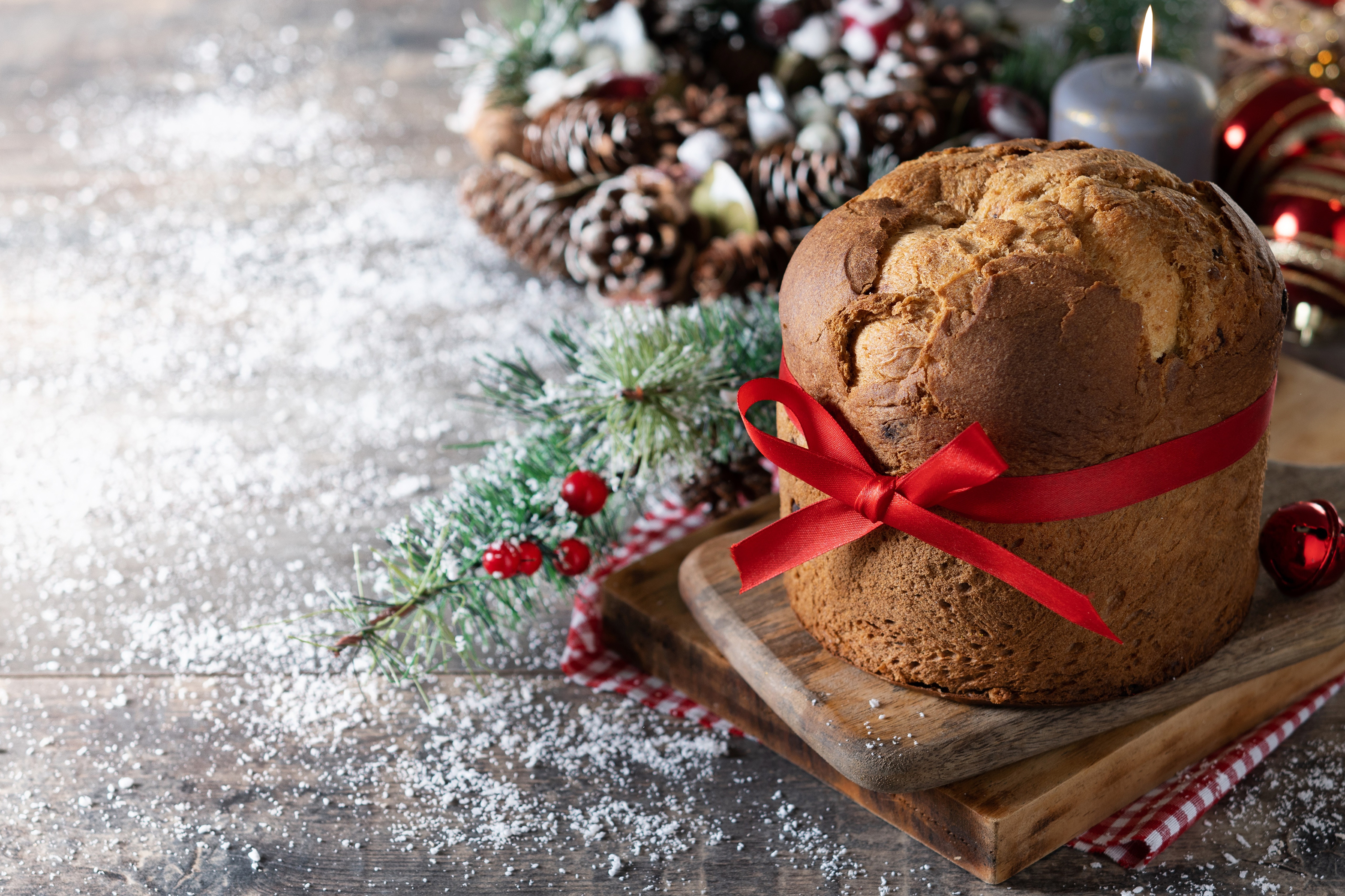 Christmas Panettone with Red Ribbon and Pine Cones HD Wallpaper