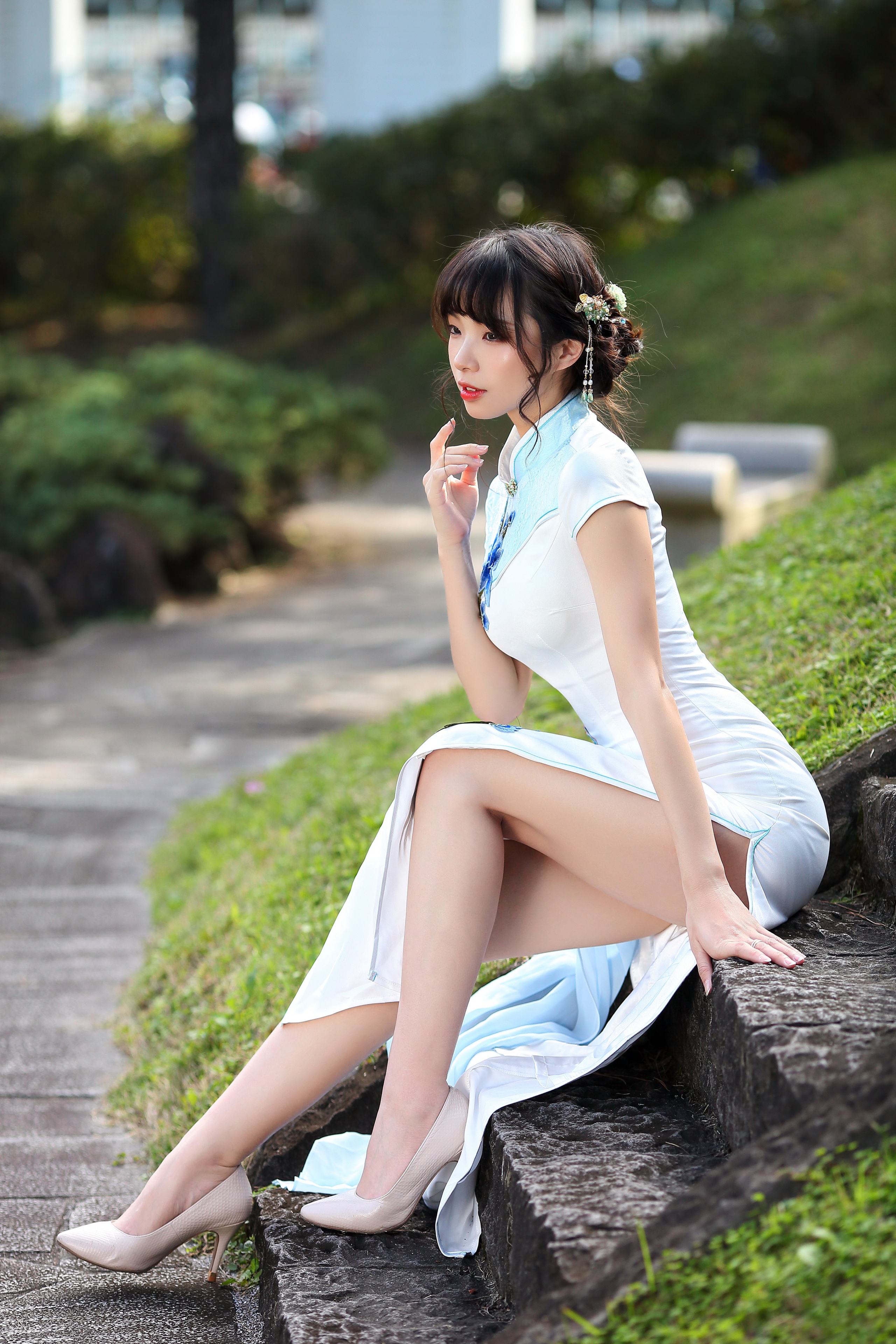 Asian woman in a white dress sitting on stairs HD Phone Wallpaper