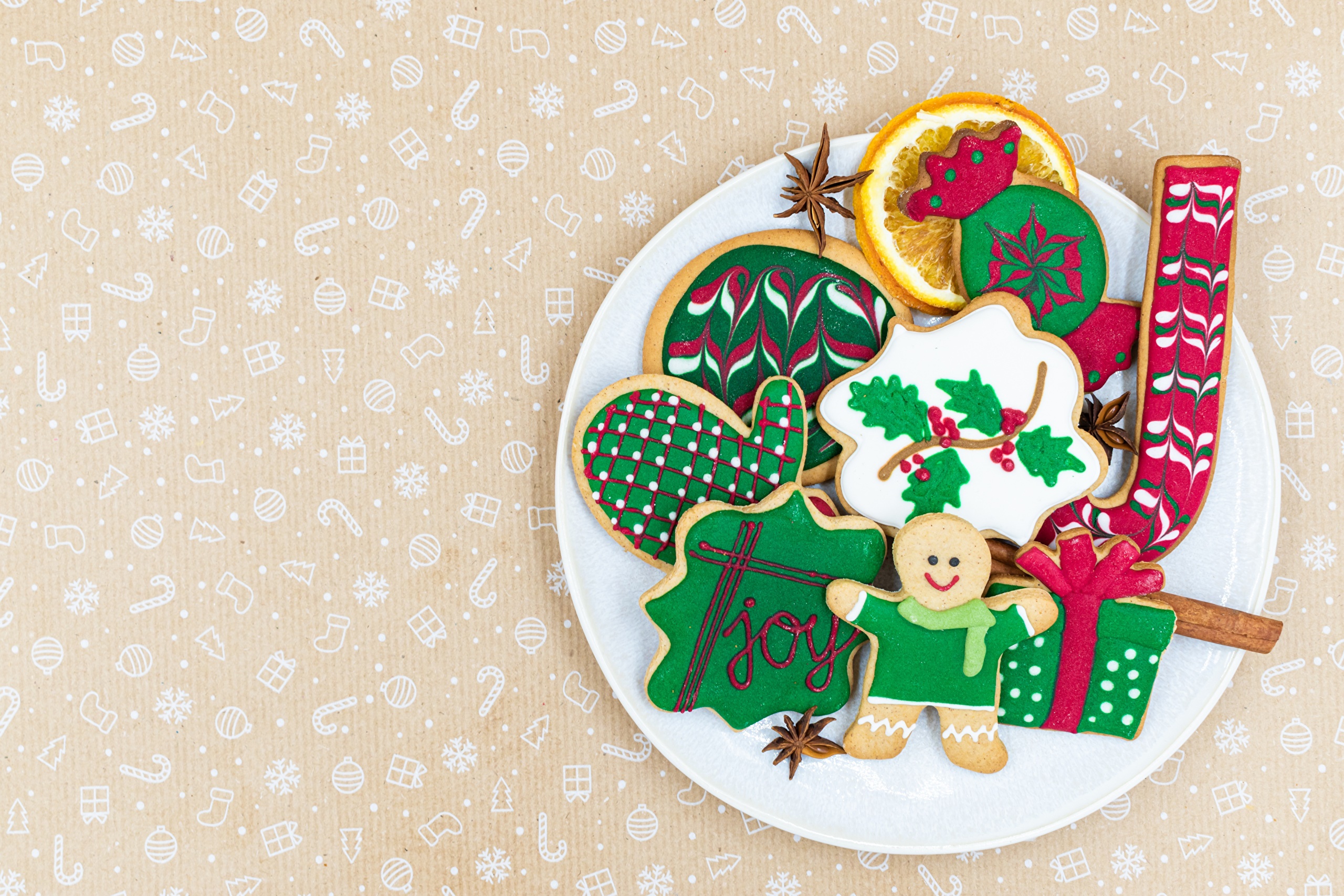 Christmas cookies on a plate with festive decorations HD Wallpaper