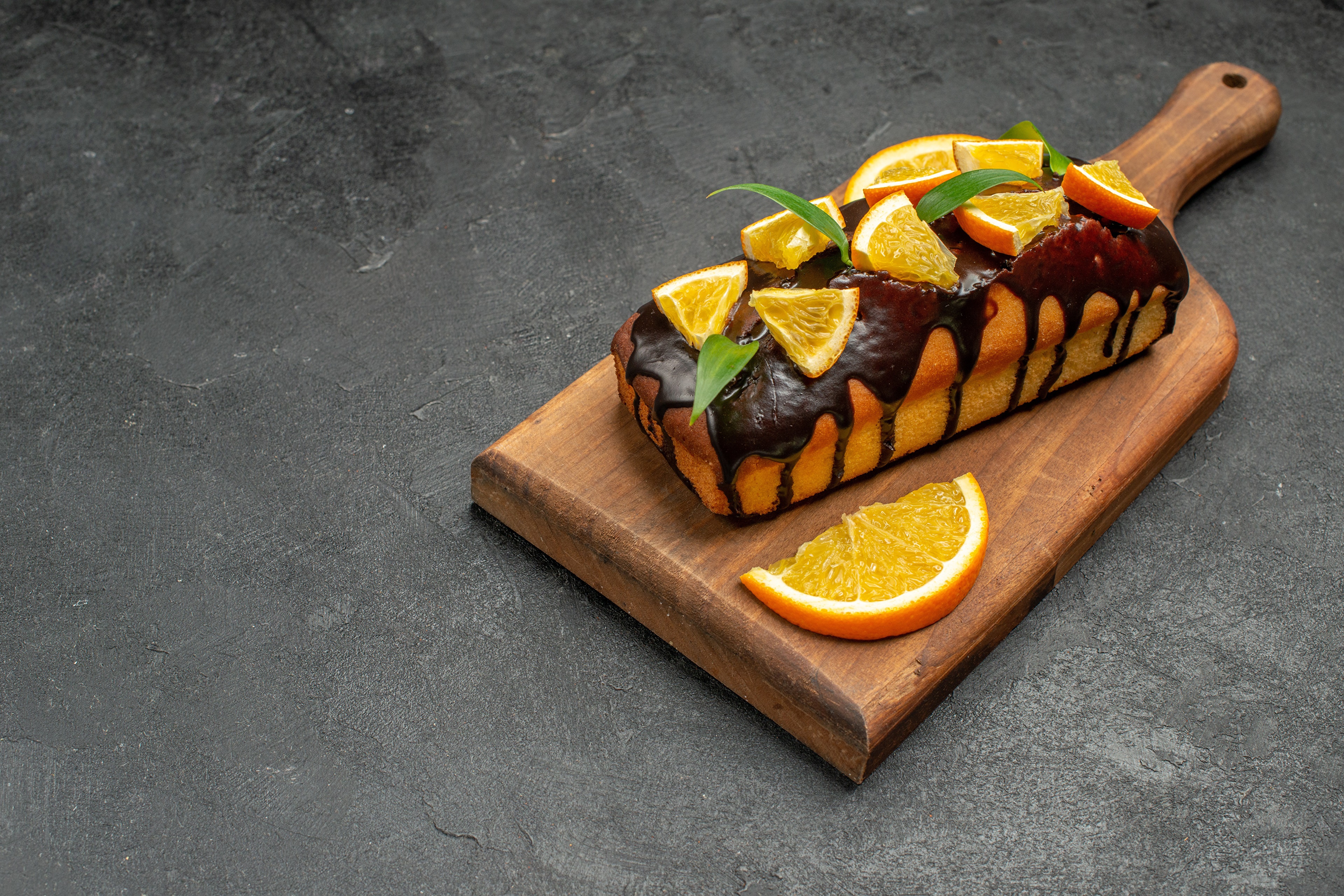 Chocolate Orange Pound Cake on Cutting Board HD Wallpaper