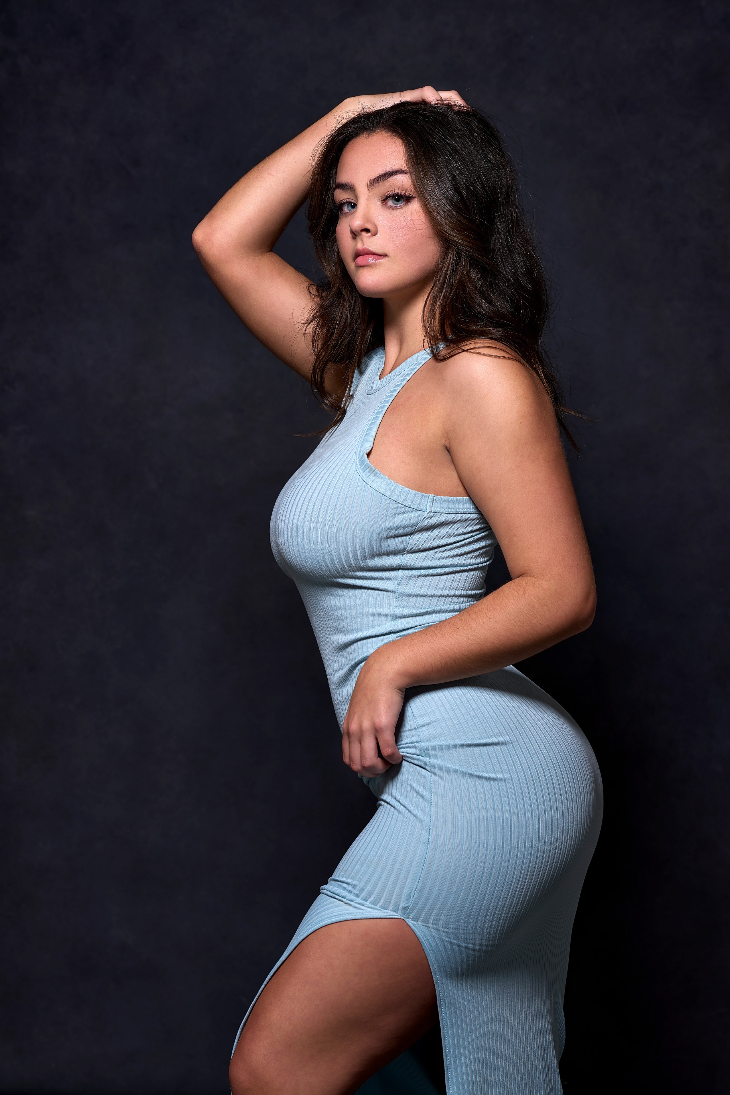 Brunette girl in a light blue dress posing HD Phone Wallpaper