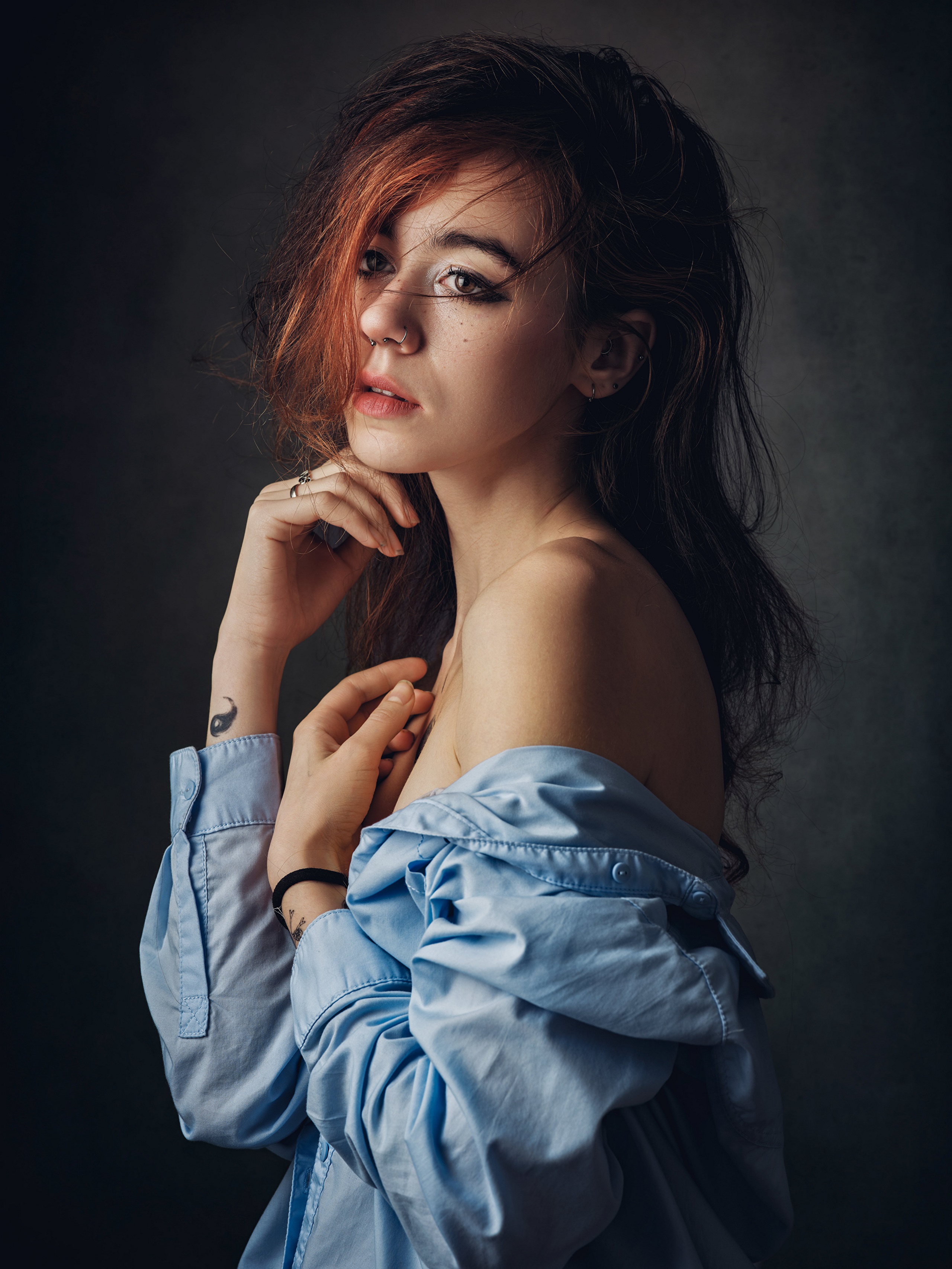 Woman with red-streaked hair in a blue shirt HD Phone Wallpaper